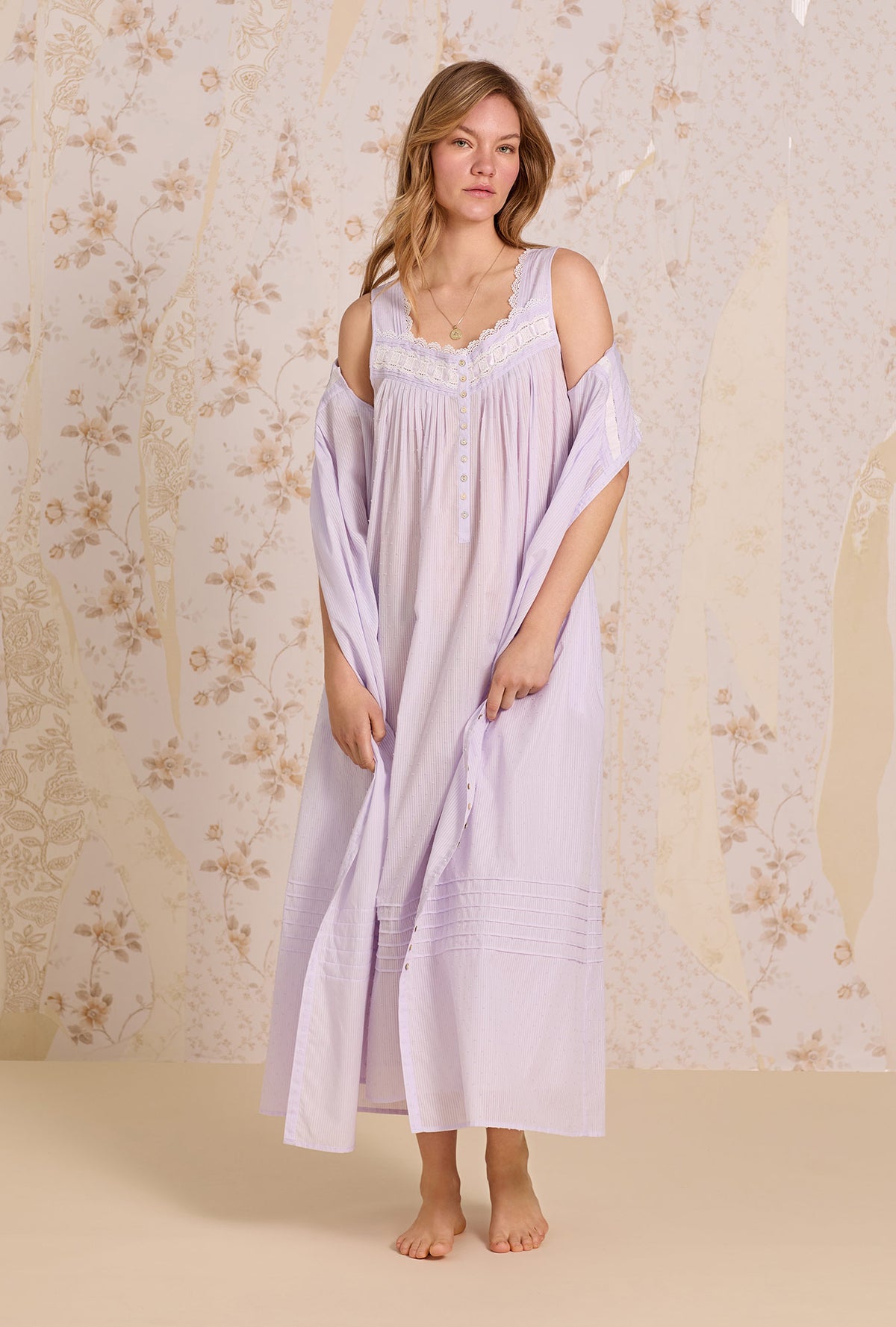 A lady wearing Provence Lavender Cotton Stripe Swiss Dot Button Front Robe