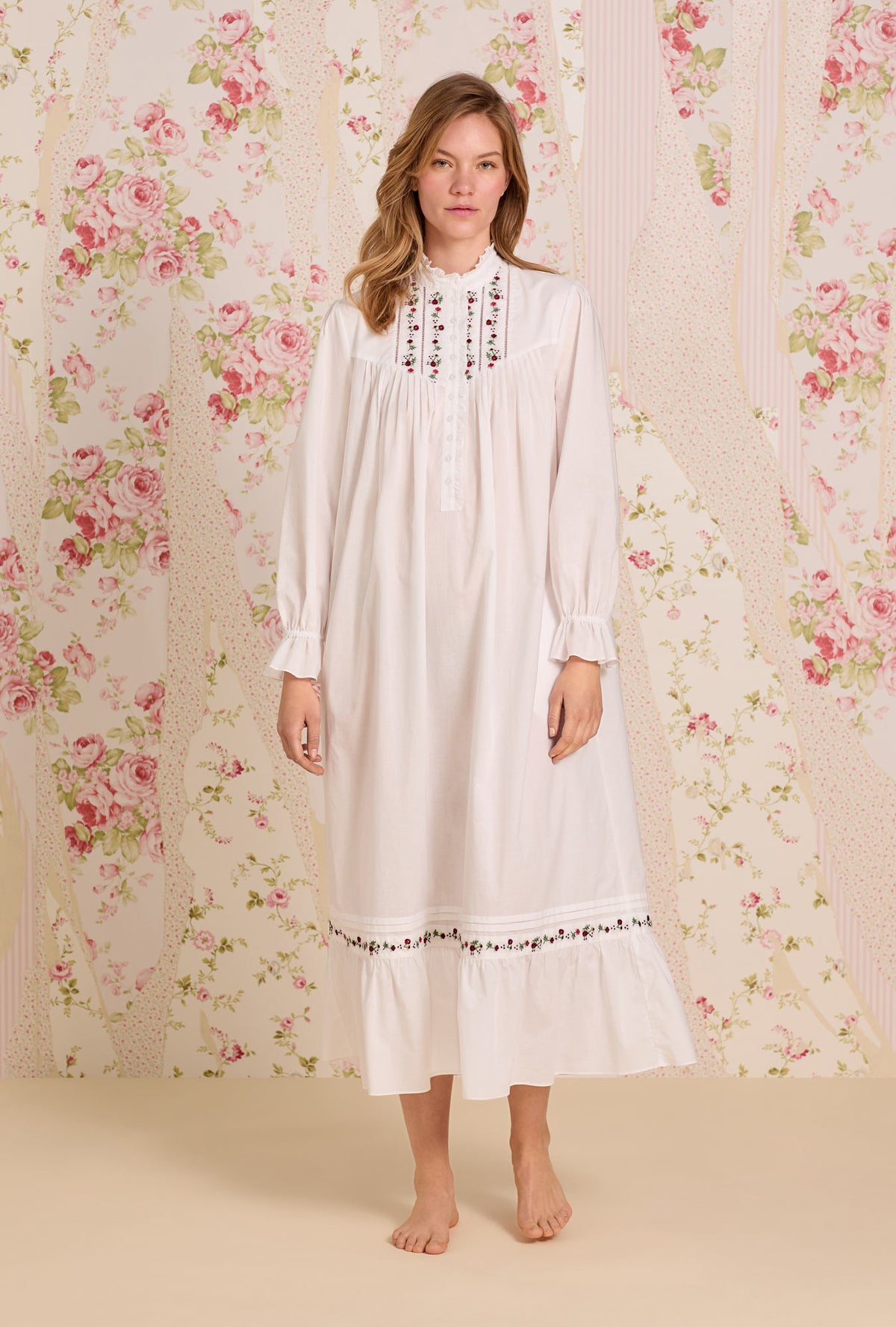 A Lady wearing Iconic White Rosevine Embroidered Cotton Lawn Highneck Ballet Nightgown