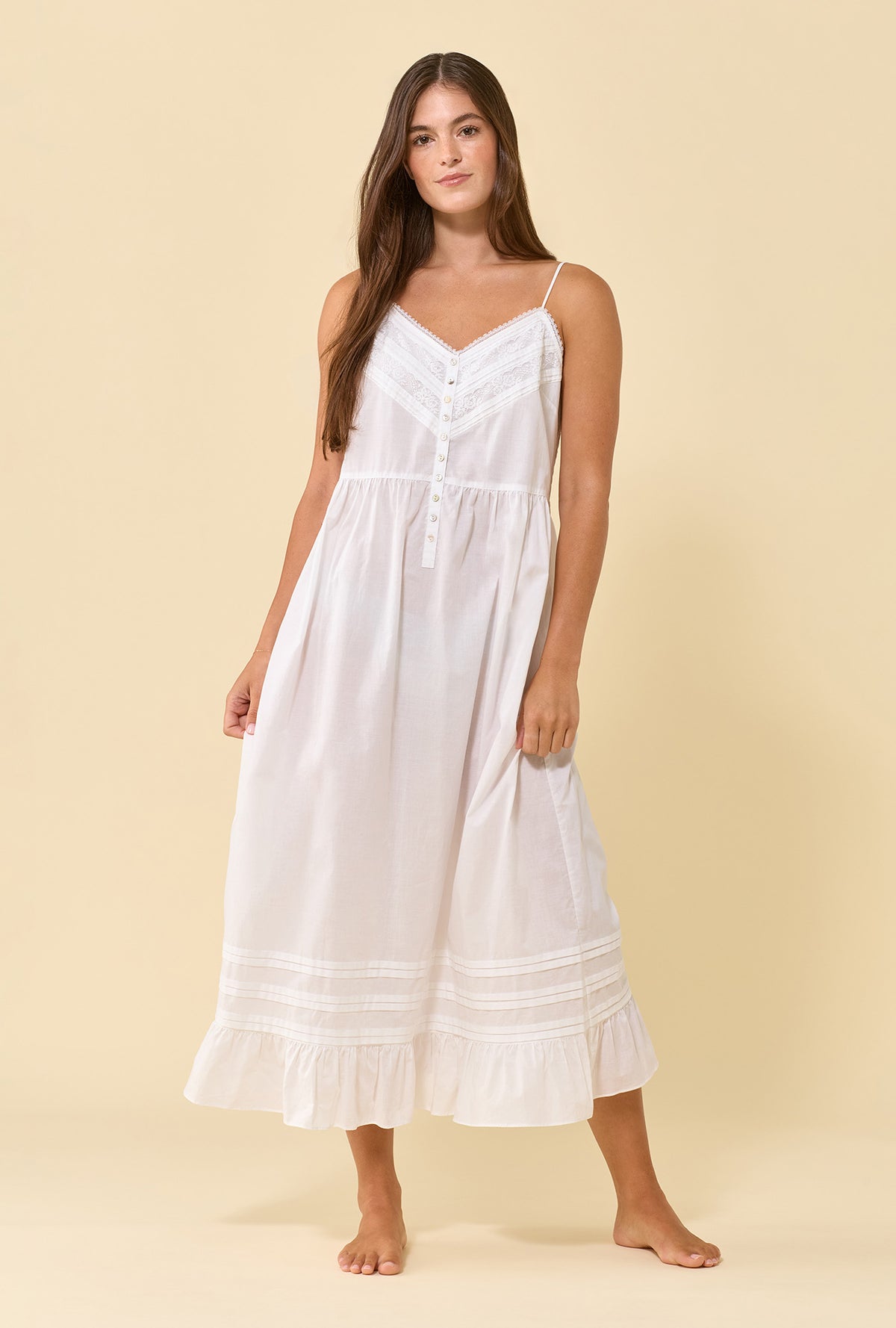 A lady wearing Elise Soft White 100% Cotton Woven Lawn Shoulder Strap Ballet Nightgown