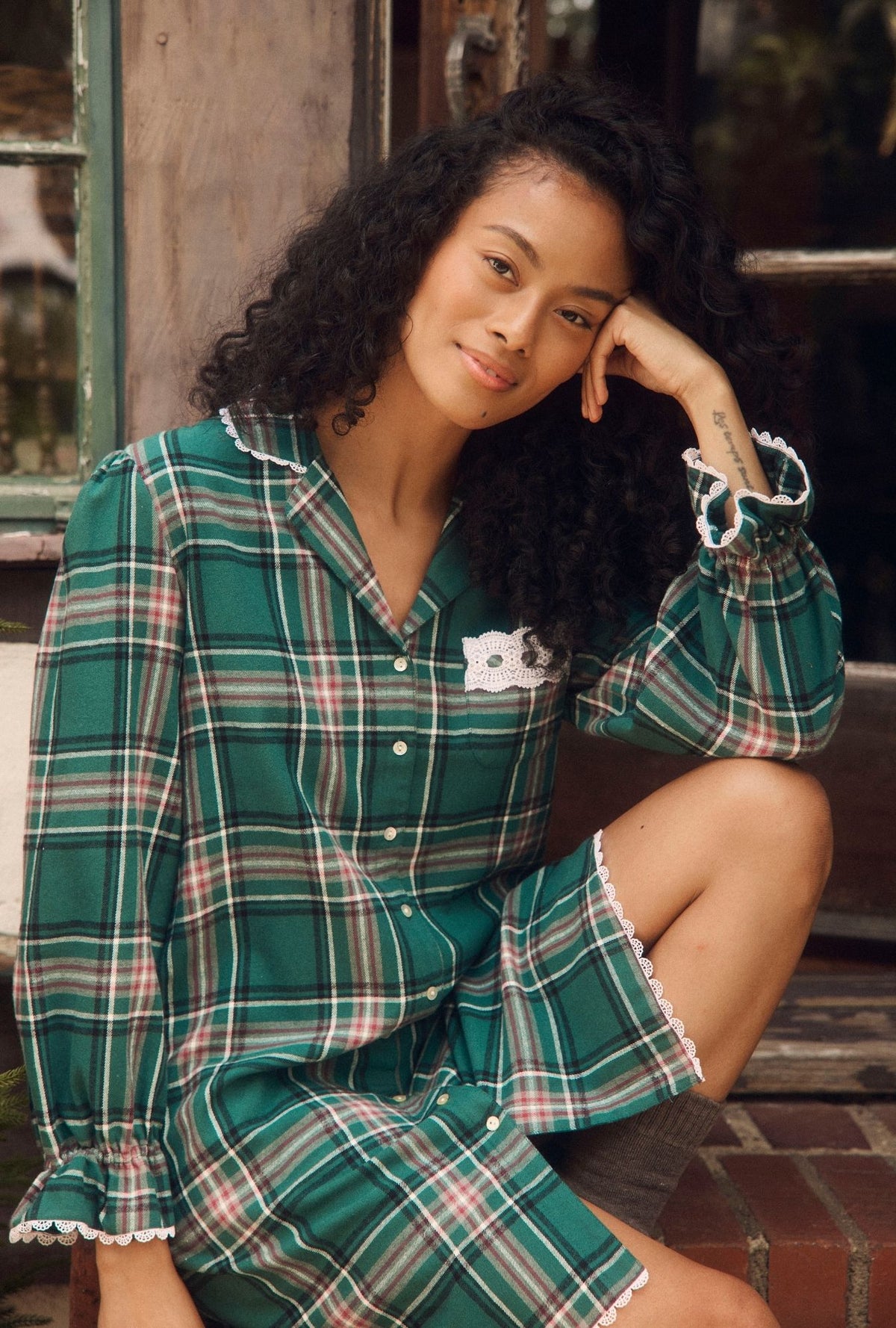 A lady wearing Evergreen Plaid Cotton Flannel Long Sleeve Nightshirt
