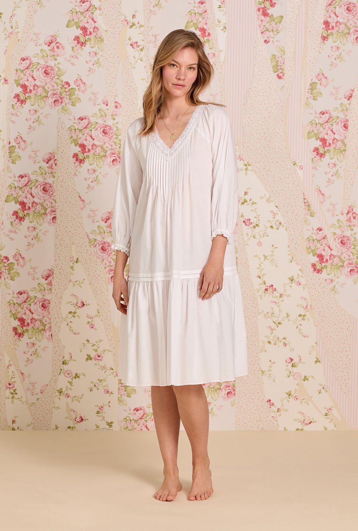 A lady wearing The "Marielle" Iconic White Cotton Lawn Waltz Nightgown