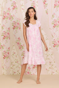  A lady wearing pink short sleeve Cotton Waltz Nightgown with  Romantic Roses print