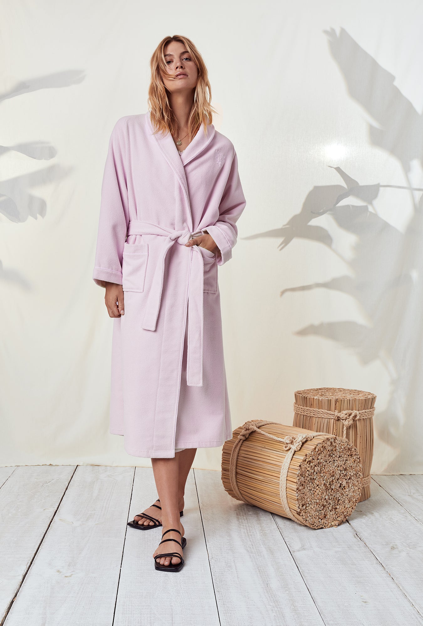 A lady wearing Spa Soft Terry Wrap Robe