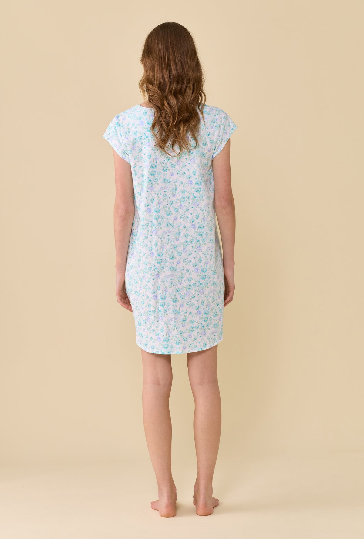 A lady wearing Aqua Reverie Nightshirt back view