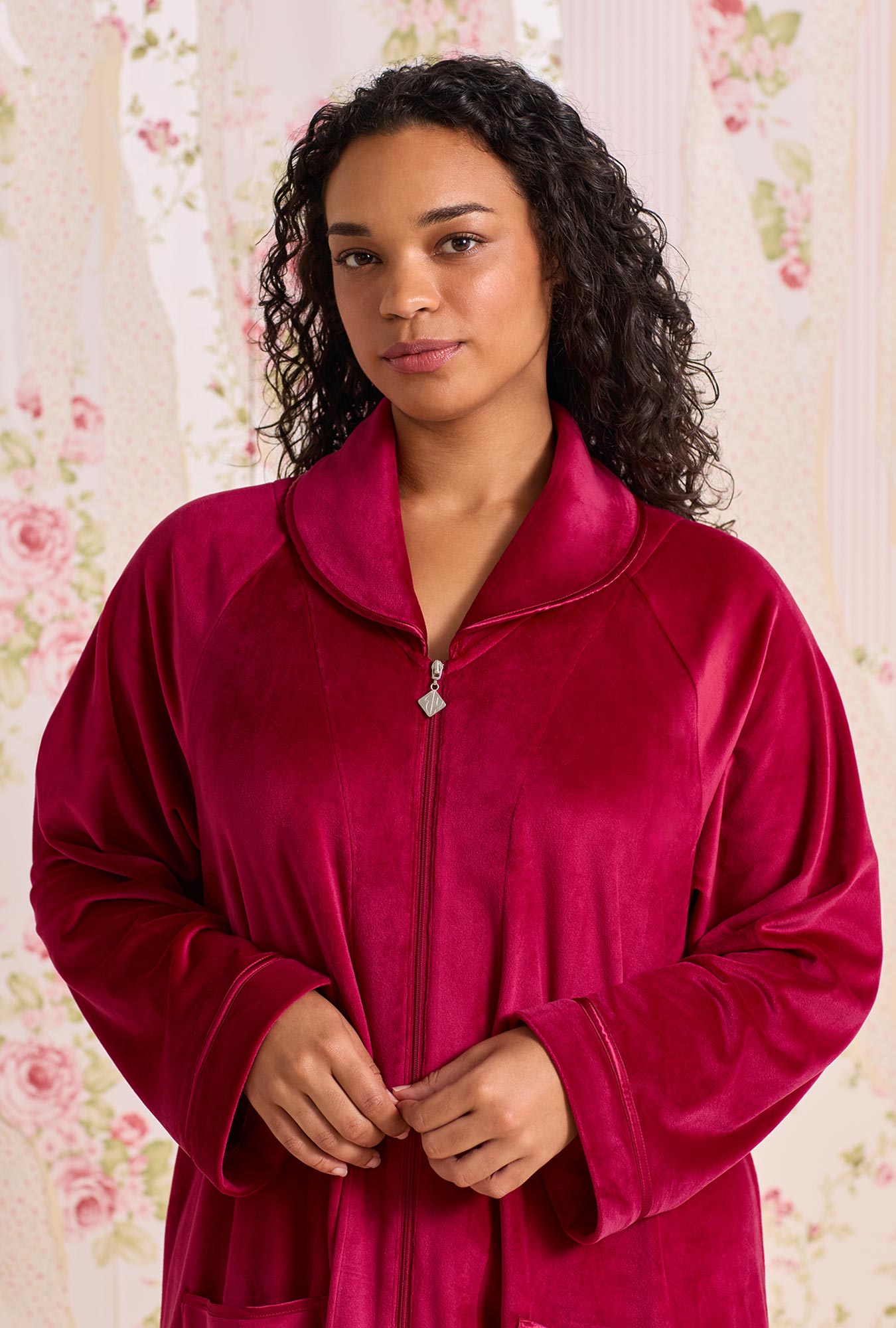 A lady wearing Lux Velour Long Zip Robe