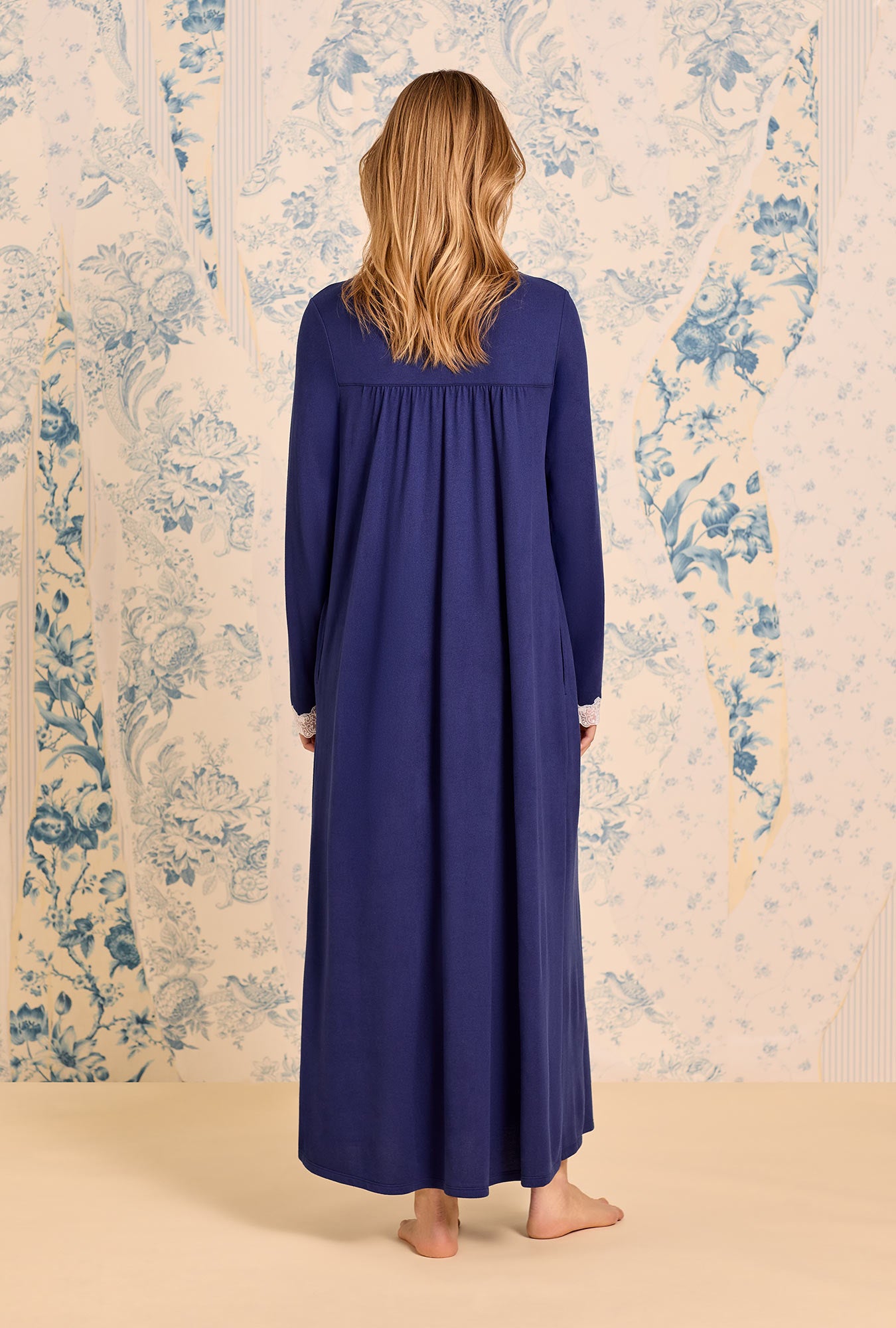 A lady wearing Classic Navy Dream Sweater Knit Long Sleeve Ballet Nightgown