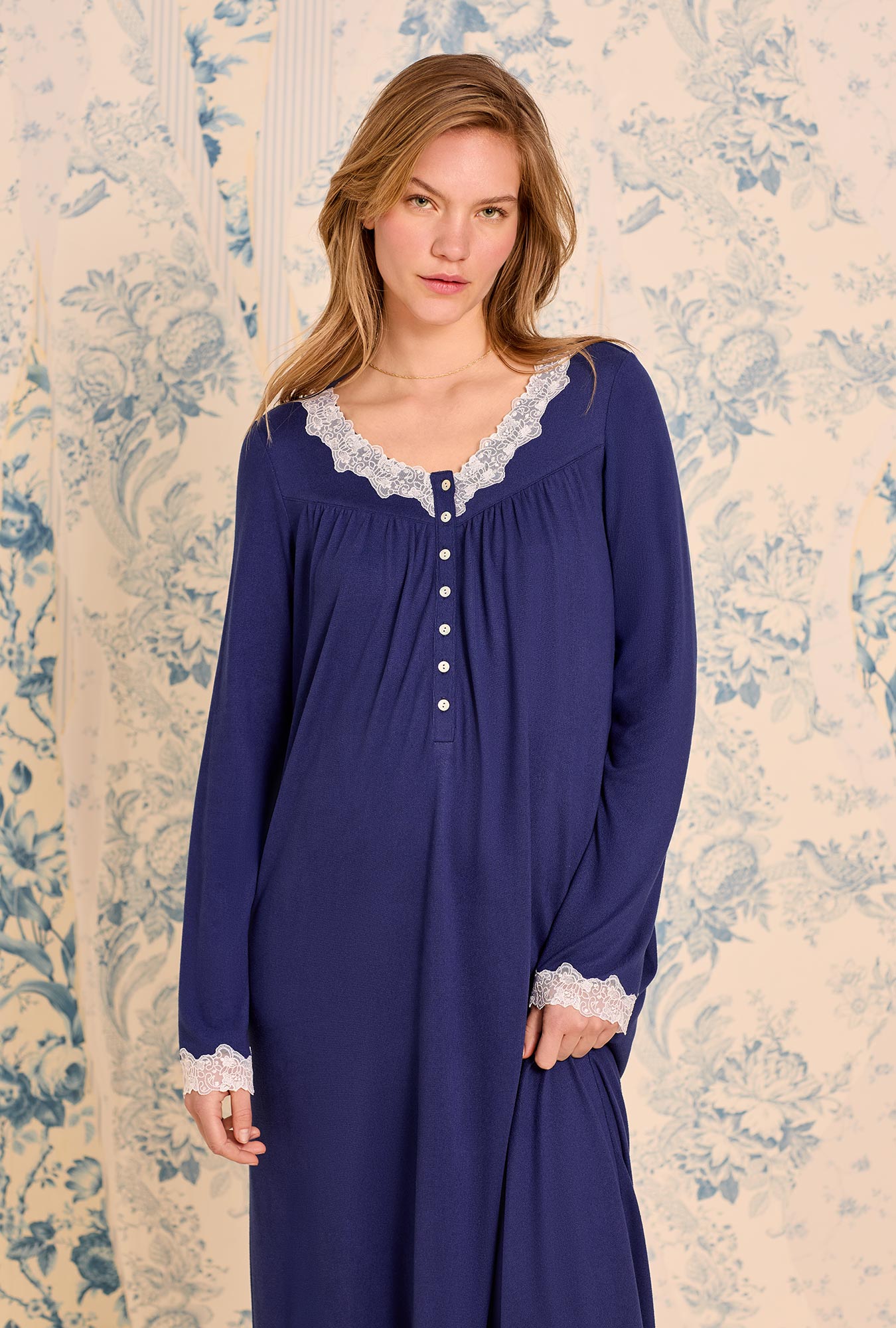 A lady wearing Classic Navy Dream Sweater Knit Long Sleeve Ballet Nightgown