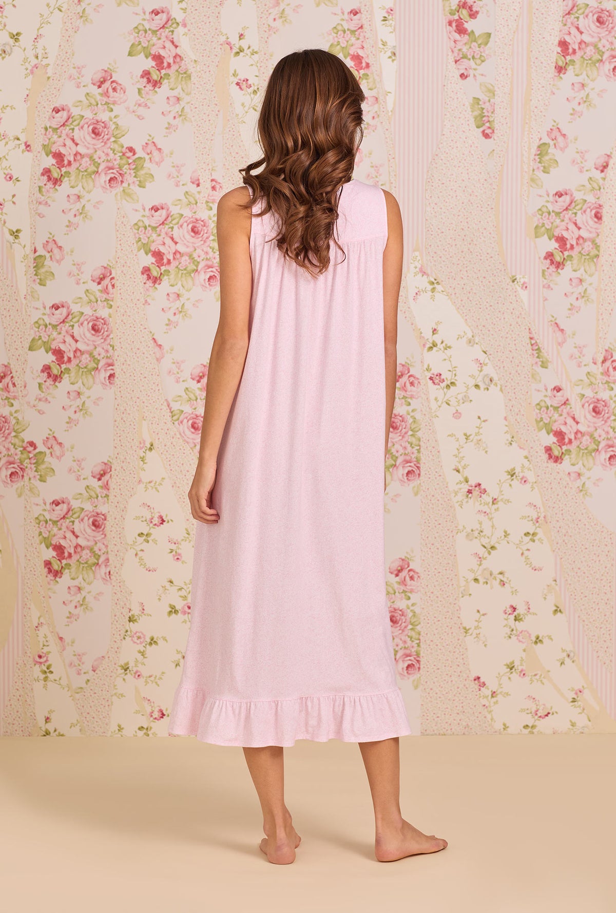 A Lady Wearing Pink Vine Cotton Knit Ballet Nightgown showing back view of the dress