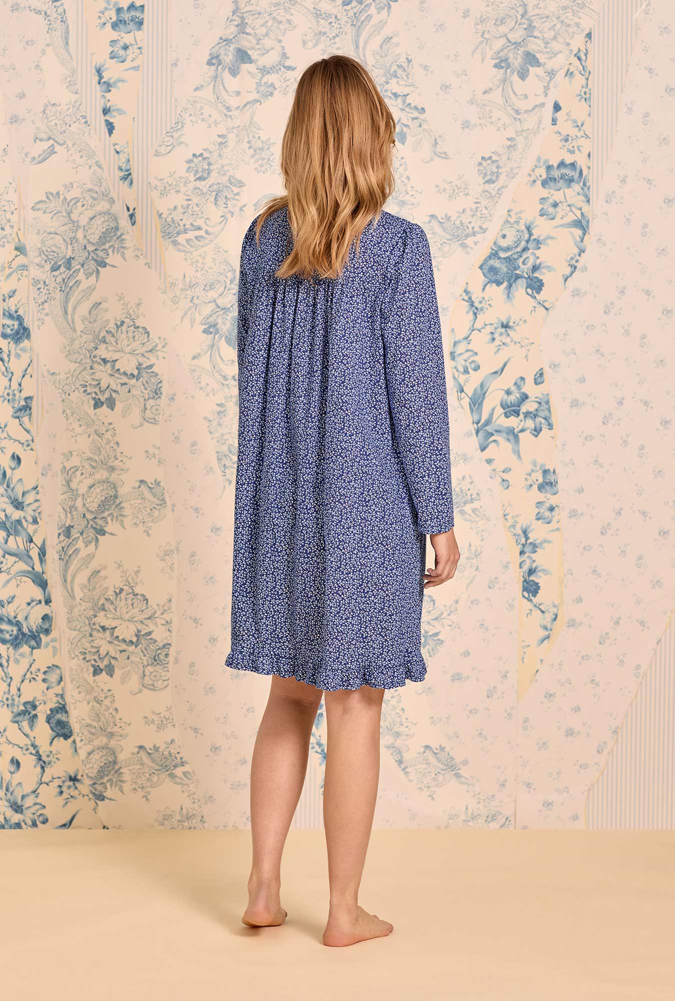 A lady wearing Navy Thistle Cotton Knit Long Sleeve Short Nightgown