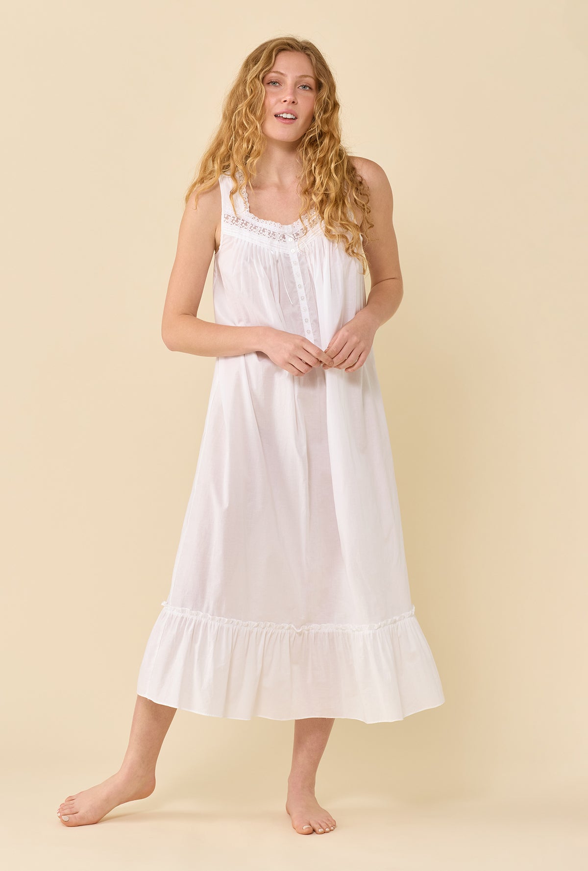 A lady wearing The Eileen Soft White Nightgown