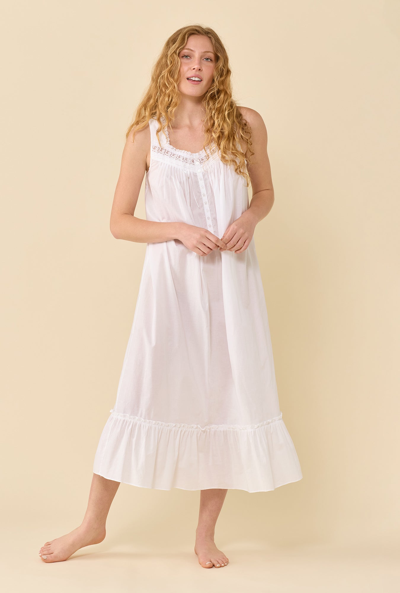 A lady wearing The Eileen Soft White Nightgown