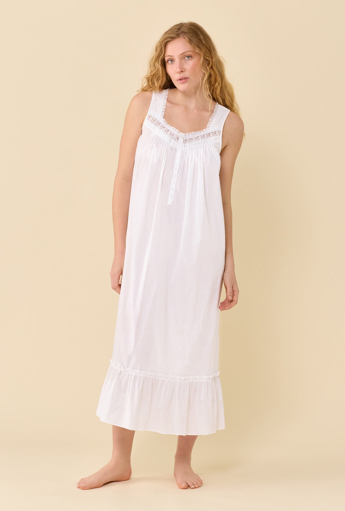 A lady wearing The Eileen Soft White Nightgown looking front