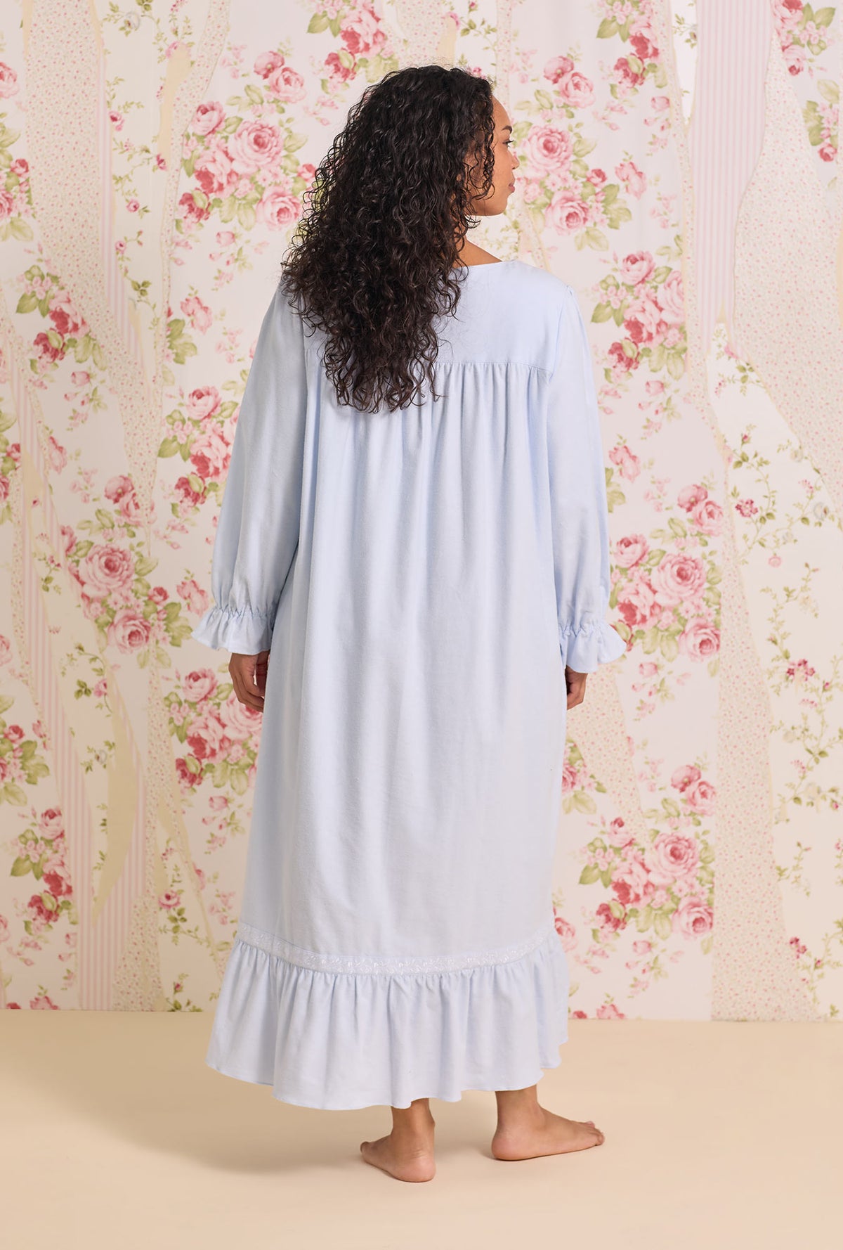 A lady wearing white Long Sleeve Cotton Flannel Embroidery Long Nightgown 