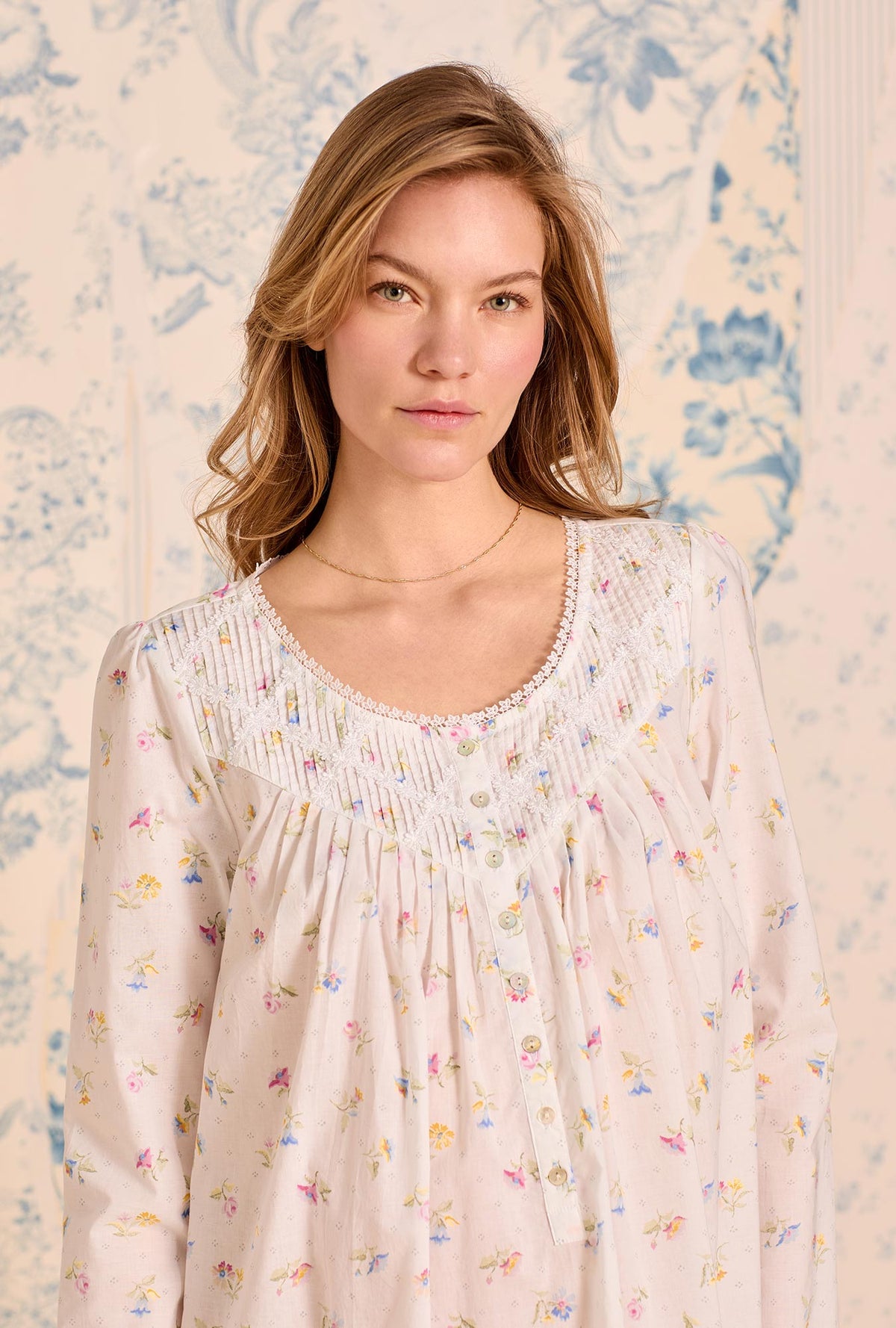 A lady wearing Cottage Posies Cotton Lawn Long Sleeve Ballet Nightgown