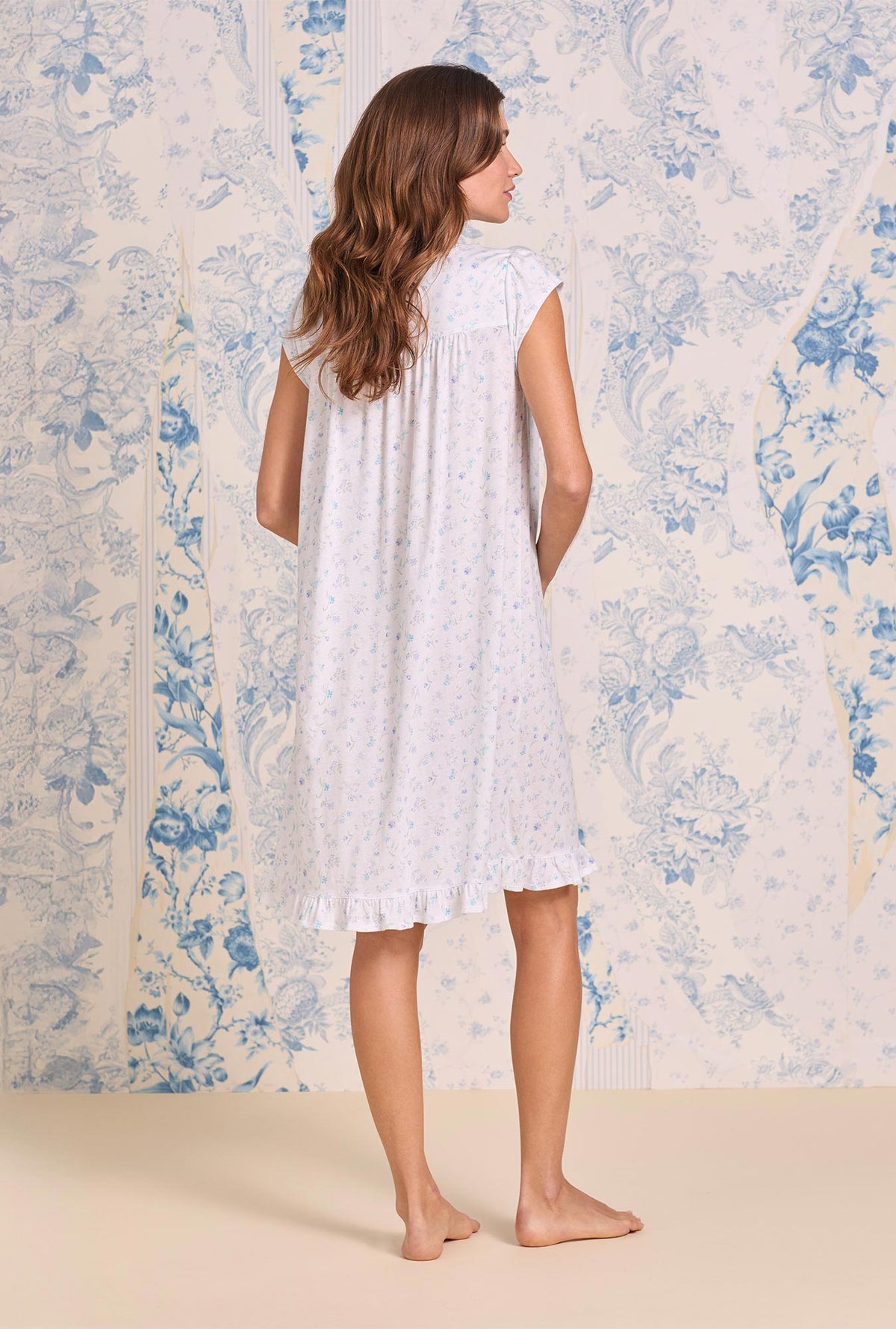 A lady wearing White Meadow Cotton Knit Cap Sleeve Waltz Nightgown back view