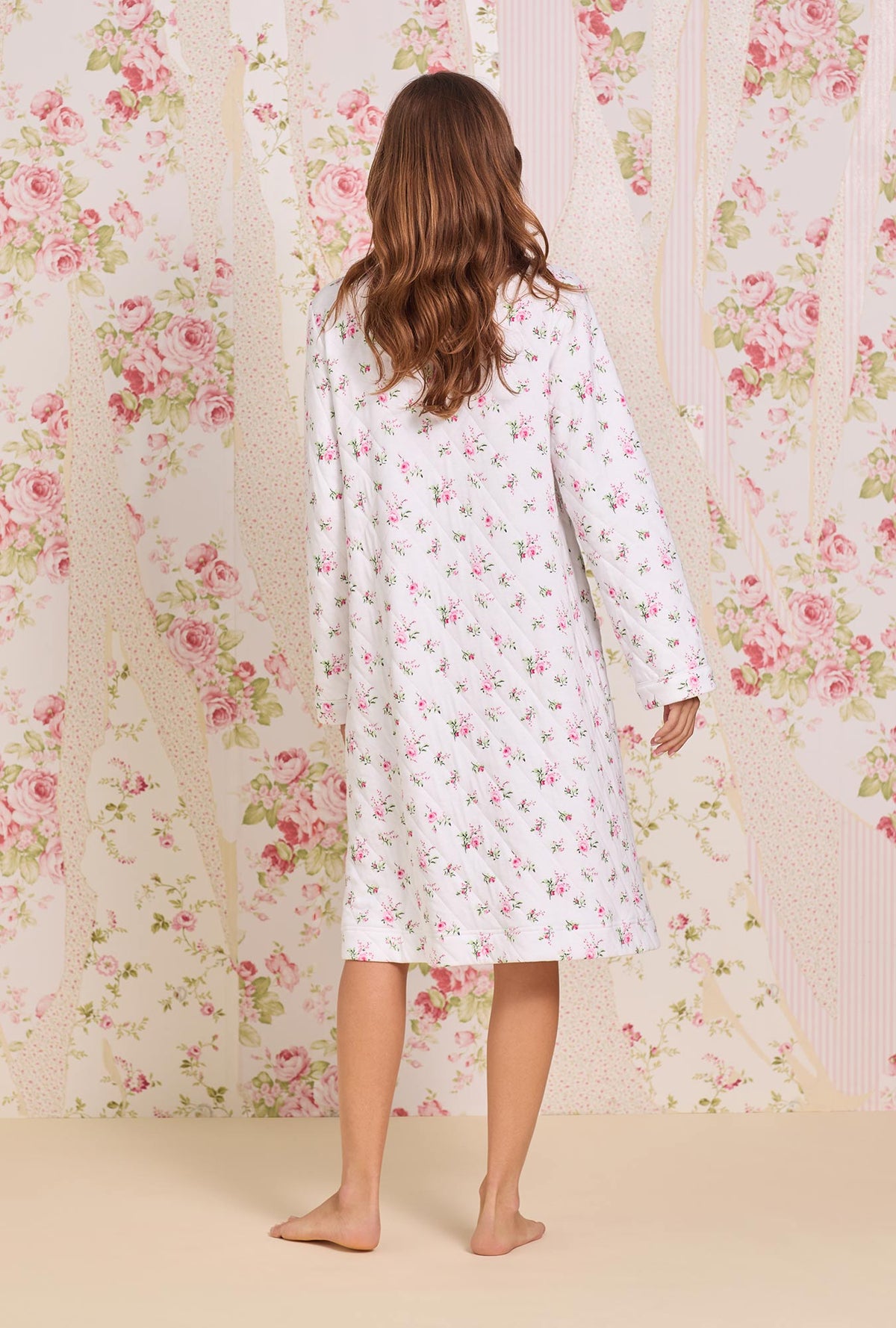 A lady wearing Rose Whispers Diamond Jacquard Zip Robe Back View