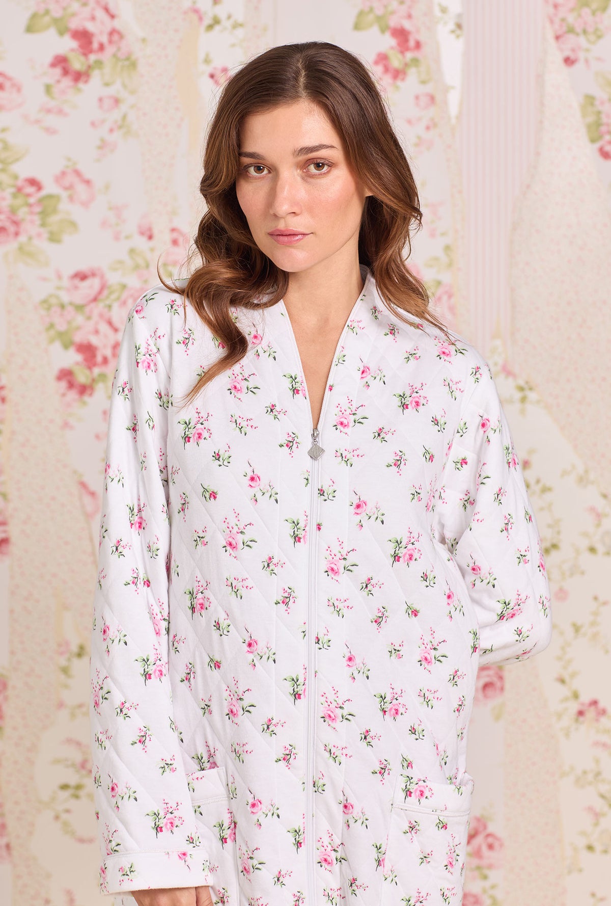 A lady wearing Rose Whispers Diamond Jacquard Zip Robe looking closer