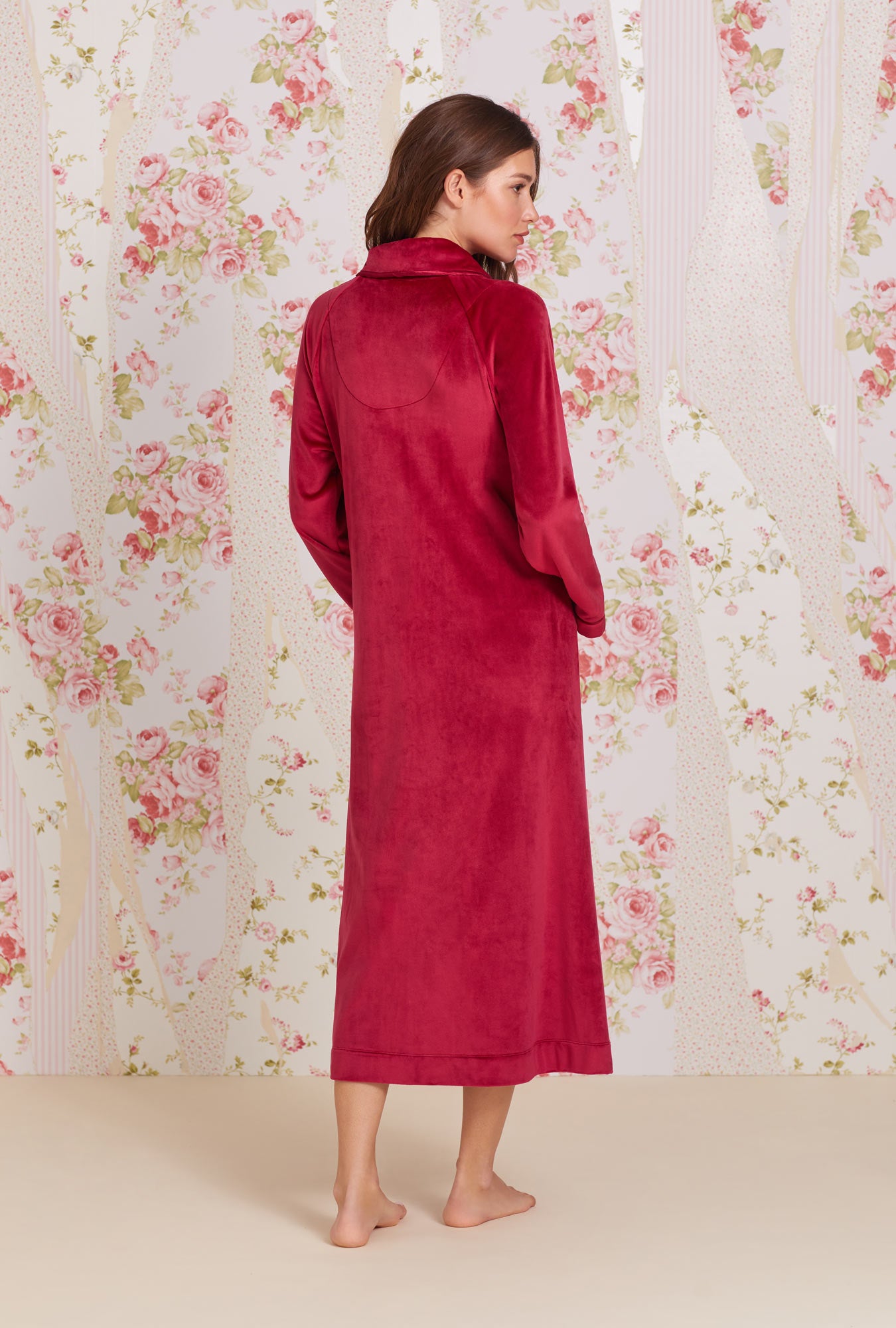 A lady wearing Lux Velour Long Zip Robe