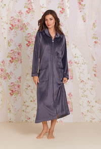 A lady wearing Lux Velour Long Zip Robe