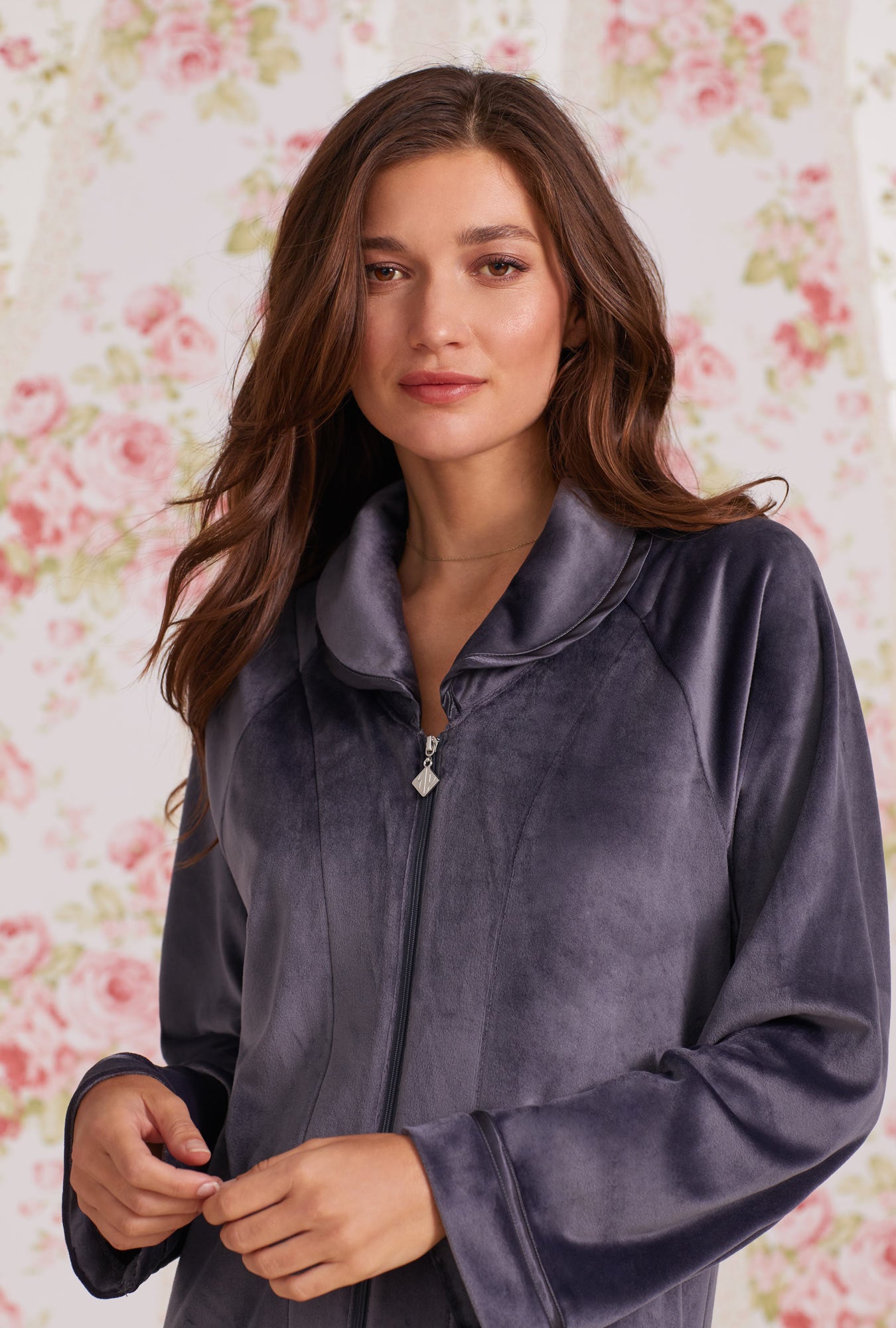 A lady wearing Lux Velour Long Zip Robe