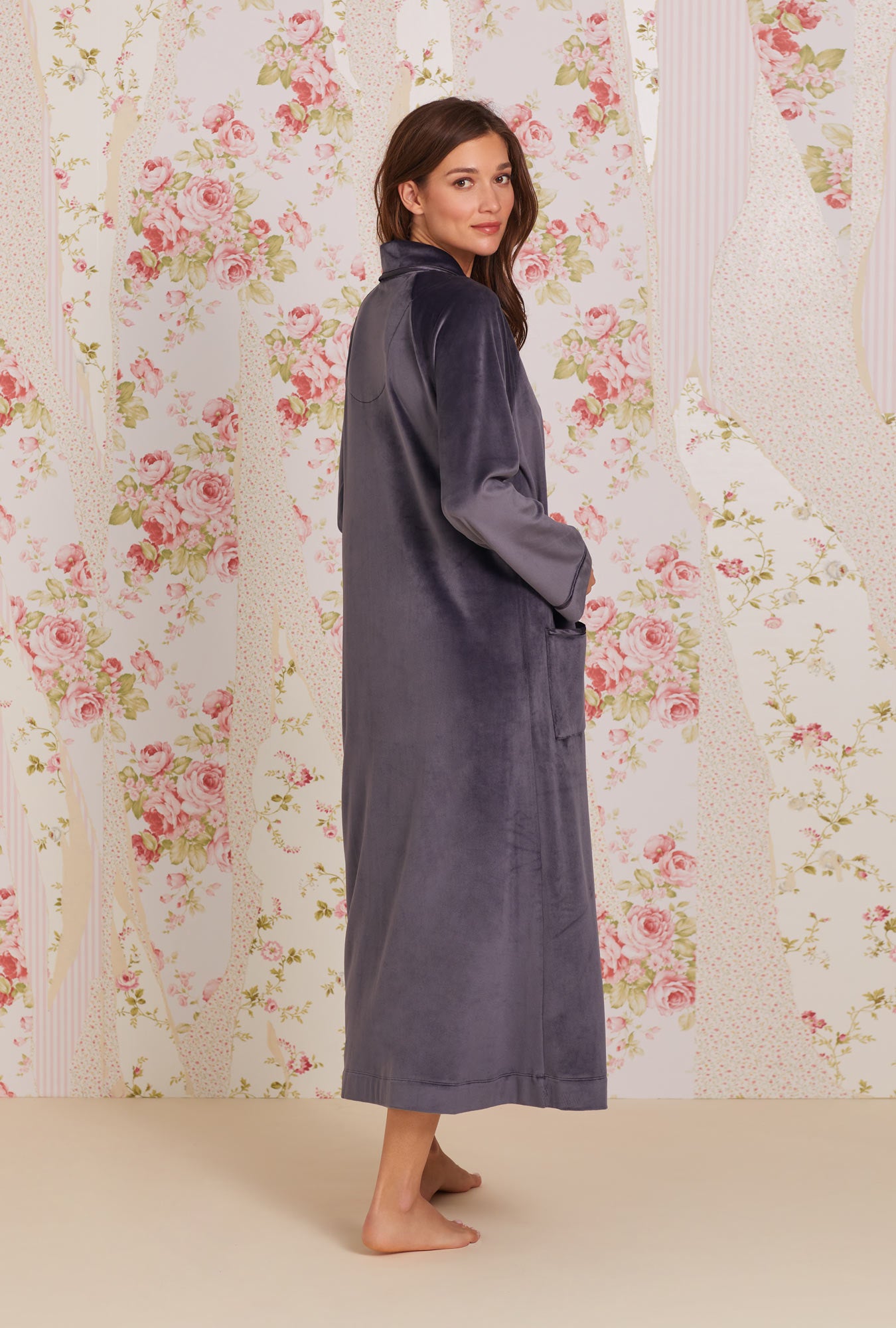 A lady wearing Lux Velour Long Zip Robe