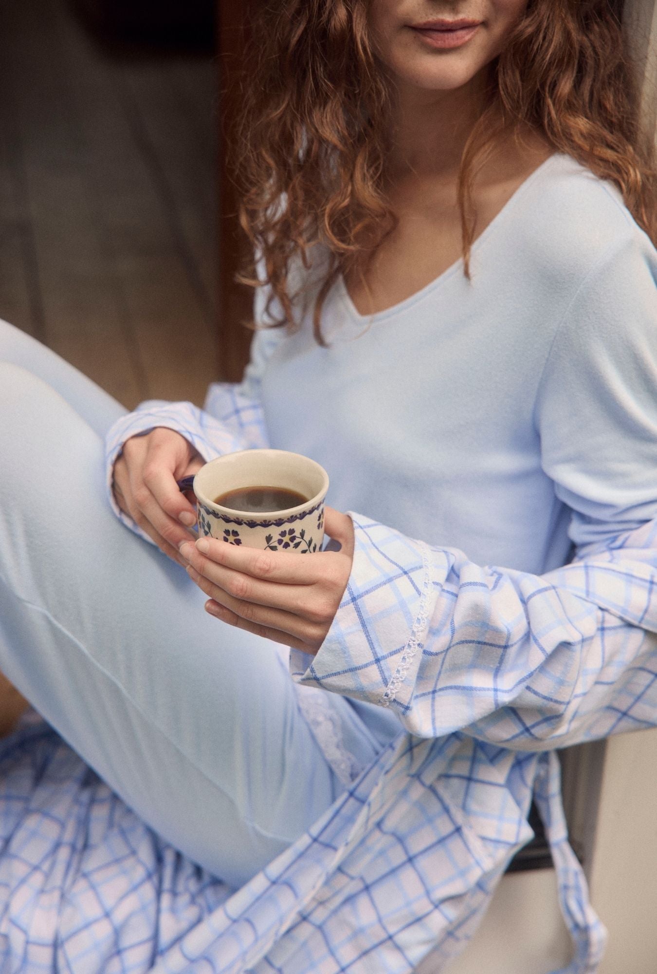 A lady wearing Blue Cozy Sweater Knit Classic Pajama Set
