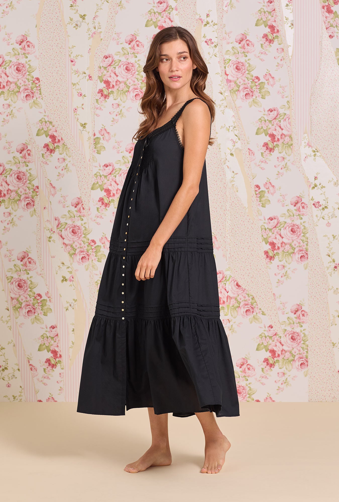 A lady wearing The "Josephine" Iconic Black Cotton Lawn Ballet Nightgown