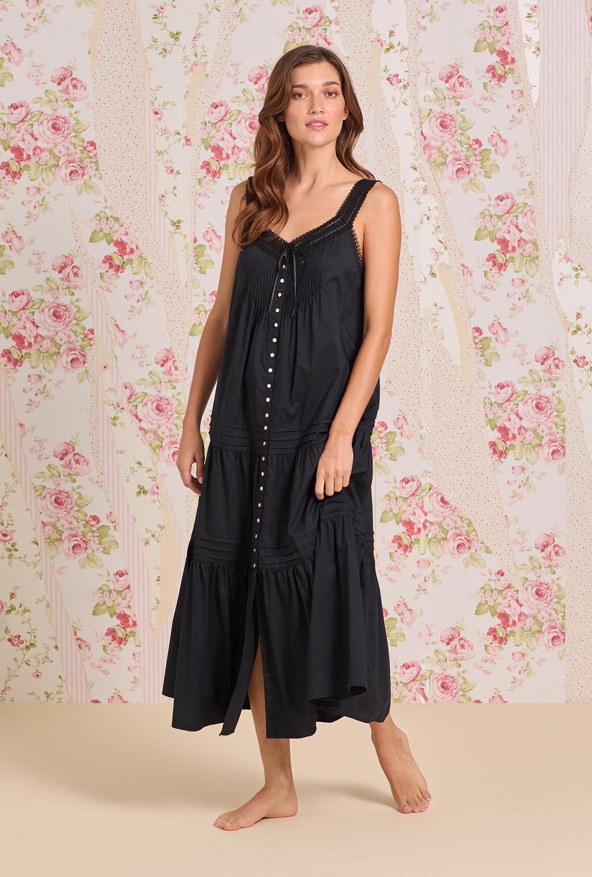 A lady wearing The "Josephine" Iconic Black Cotton Lawn Ballet Nightgown