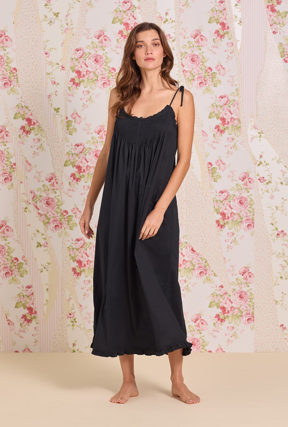 A Lady wearing The "Lucille" Iconic Black Cotton Lawn Ballet Nightgown looking front
