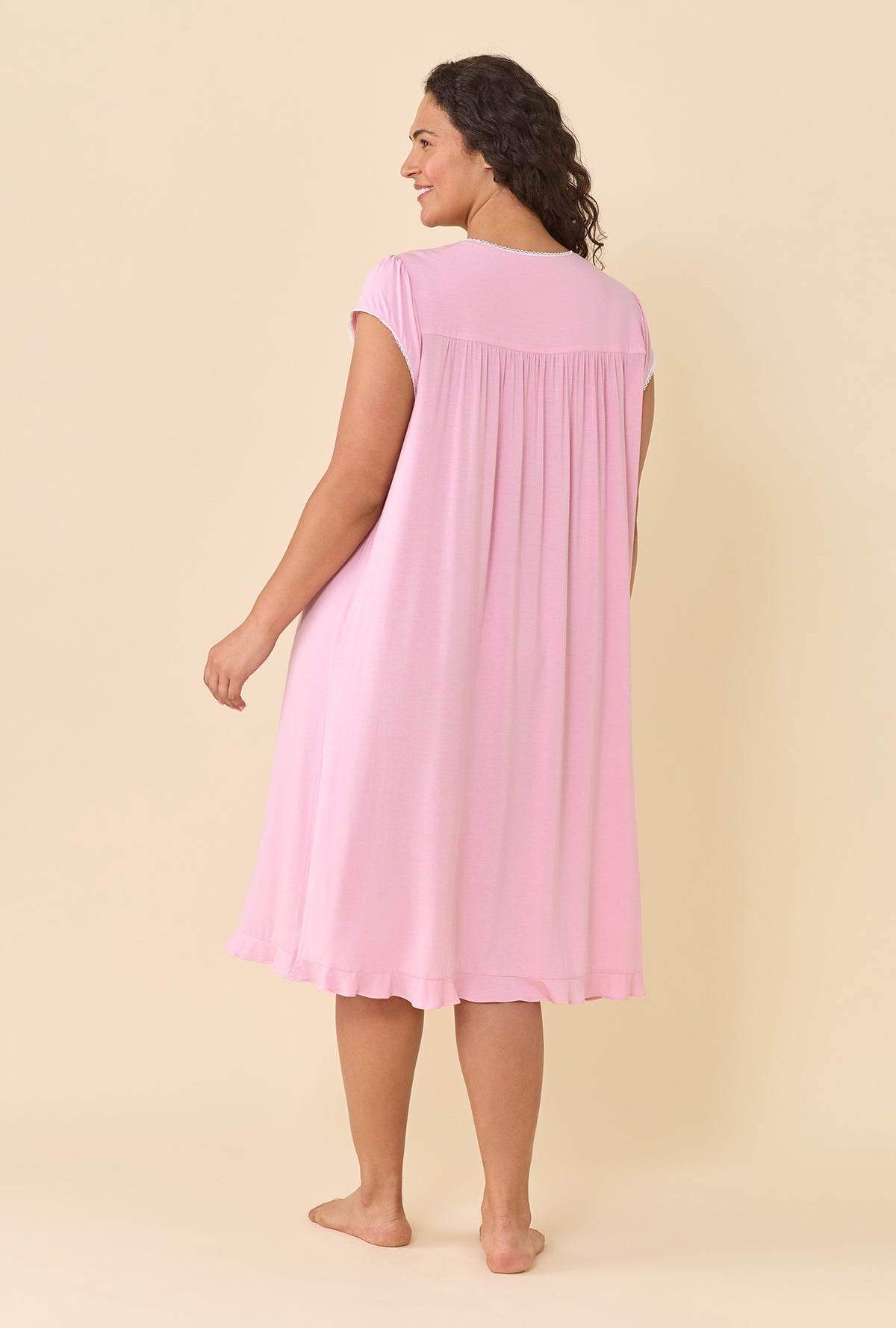 A lady wearing plus size Dusty Rose Nightgown back view