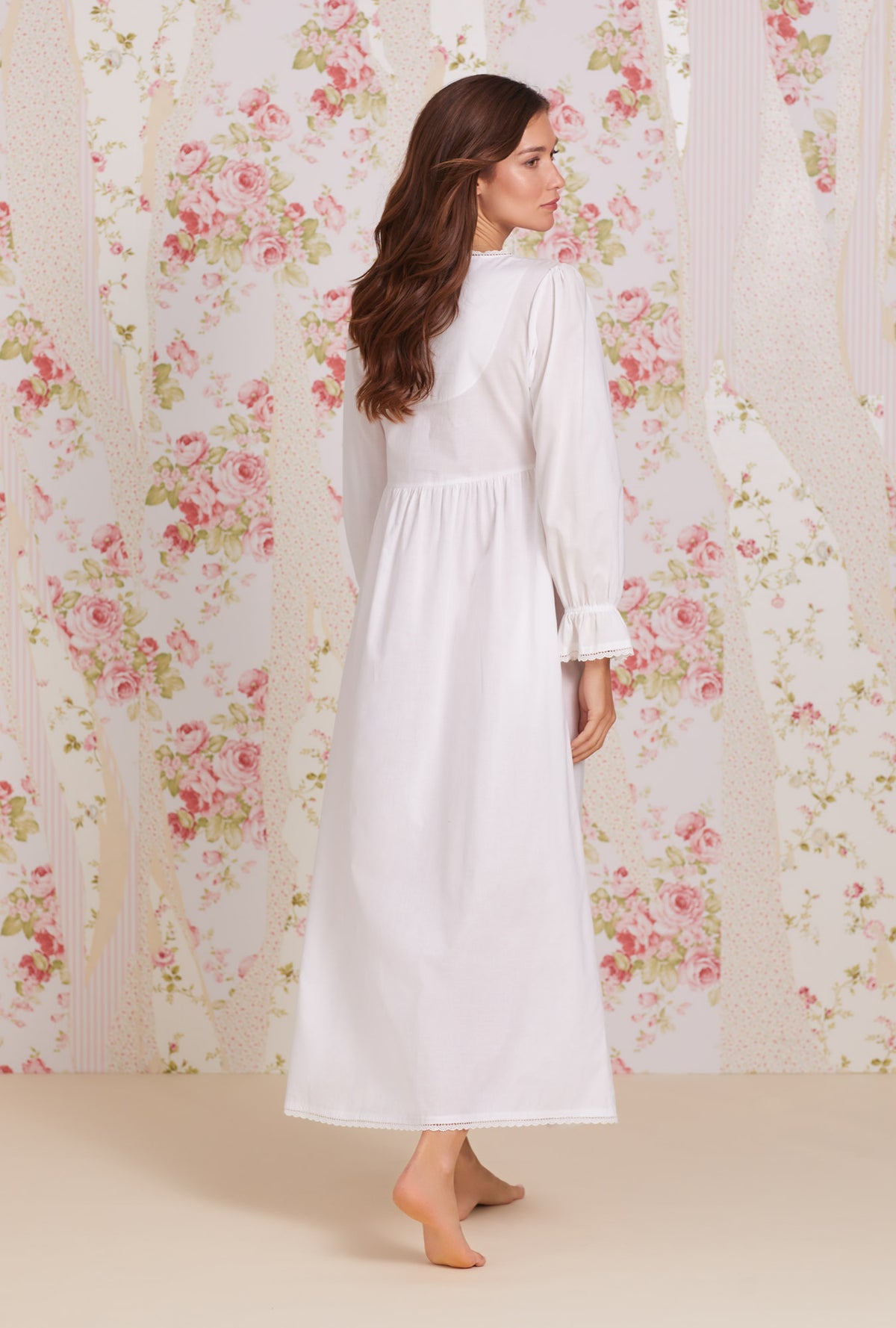 A lady wearing white Long Sleeve Cotton Button Front Robe with Calla Lily print