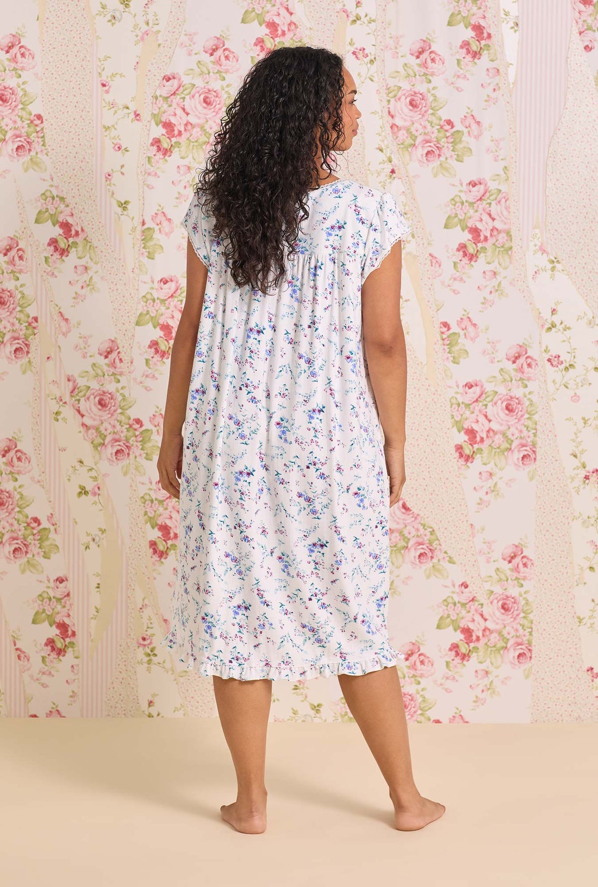 a lady wearing plus size Cottage Flora Cotton Pointelle Cap Sleeve Waltz Nightgown
