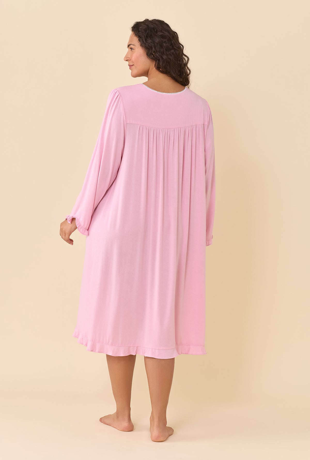 A lady wearing plus size Dusty Rose Long Sleeve Nightgown back view