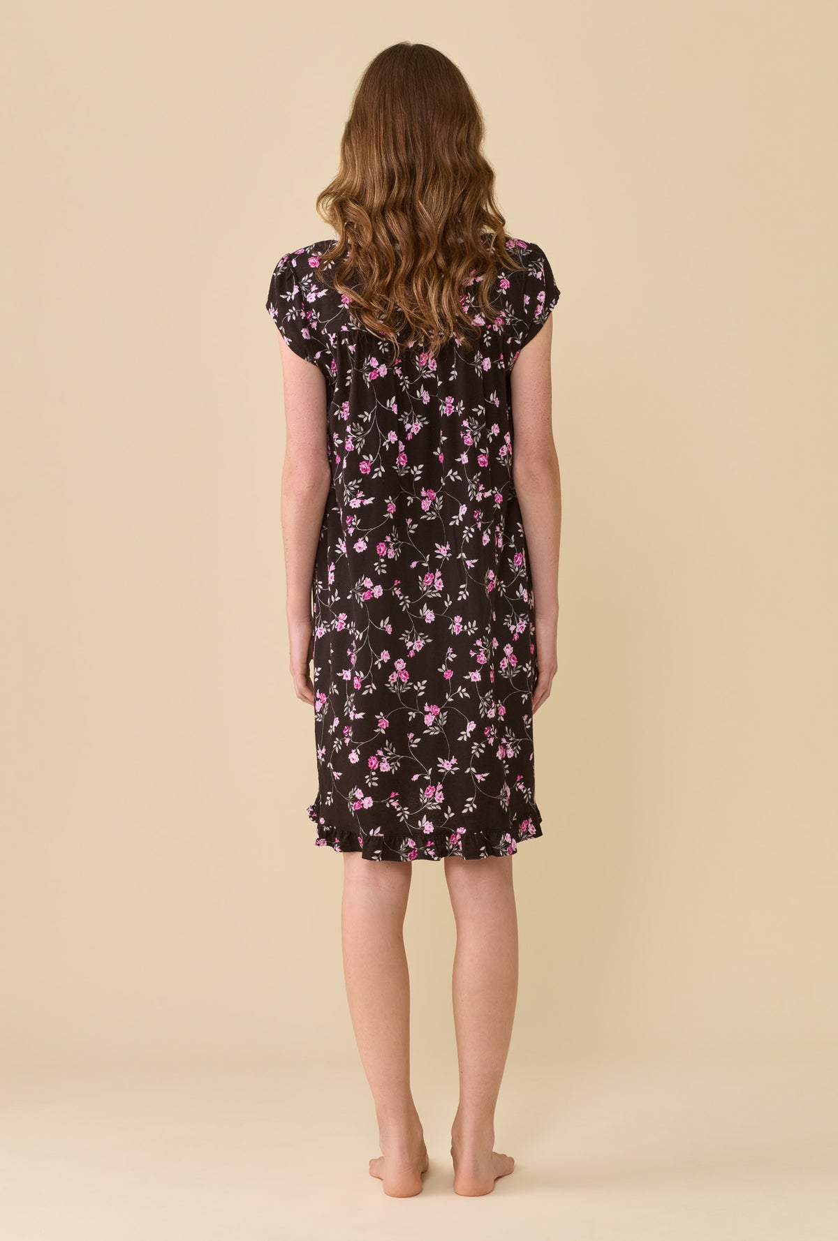 A lady wearing Vintage Vine Cap Sleeve Chemise back view