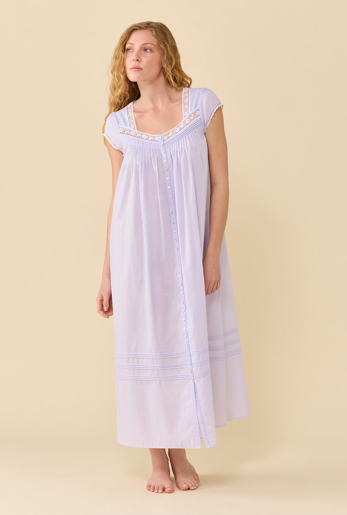 A lady wearing Swiss Dot Robe Wild Lavender looking up