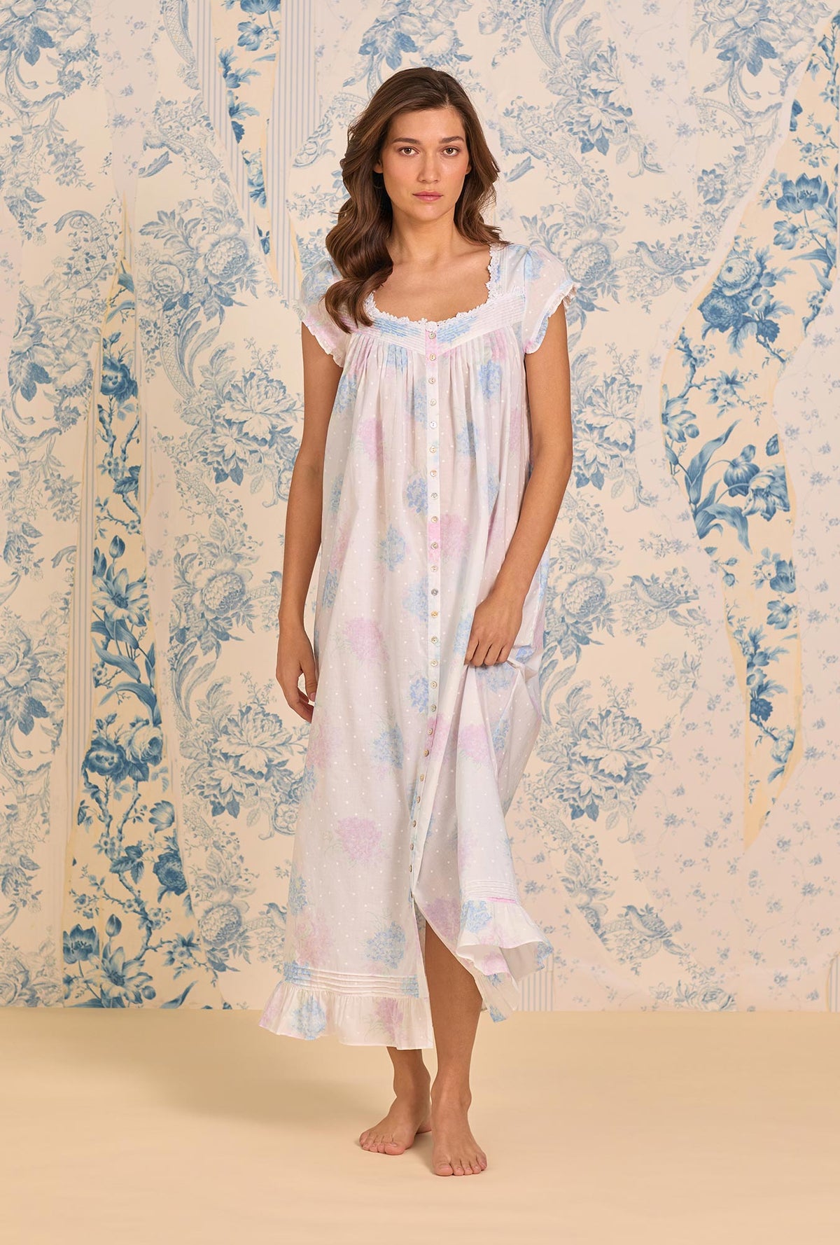 A lady wearing Hydrangea Blossom Cotton Lawn Button Front Robe looking front