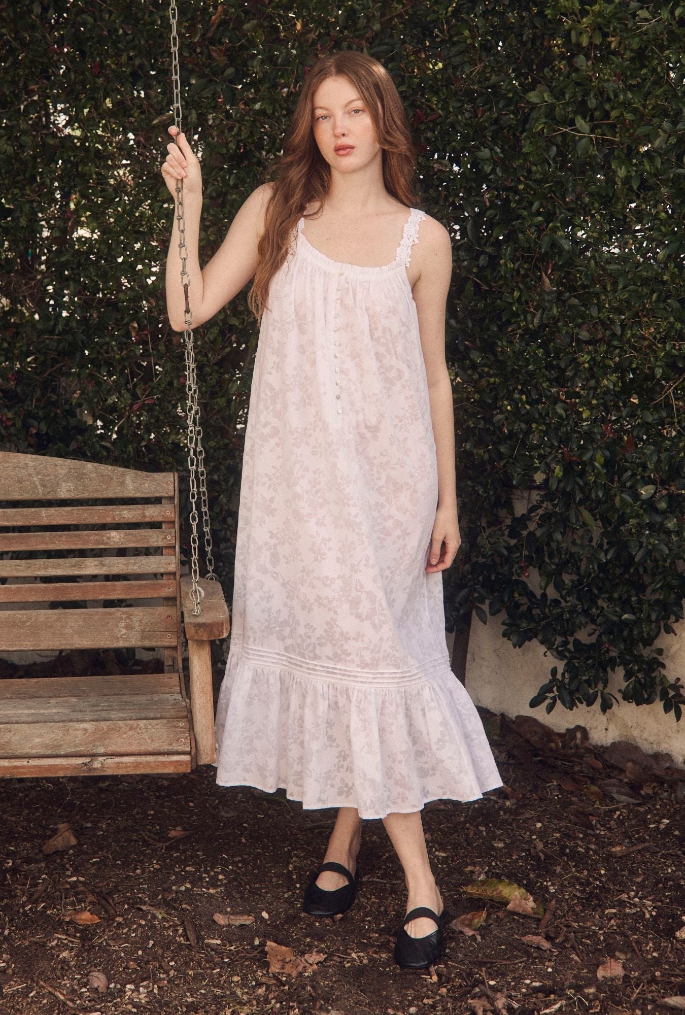 A lady wearing The "Jocelyn" Floral Devoré Ballet Nightgown in the garden