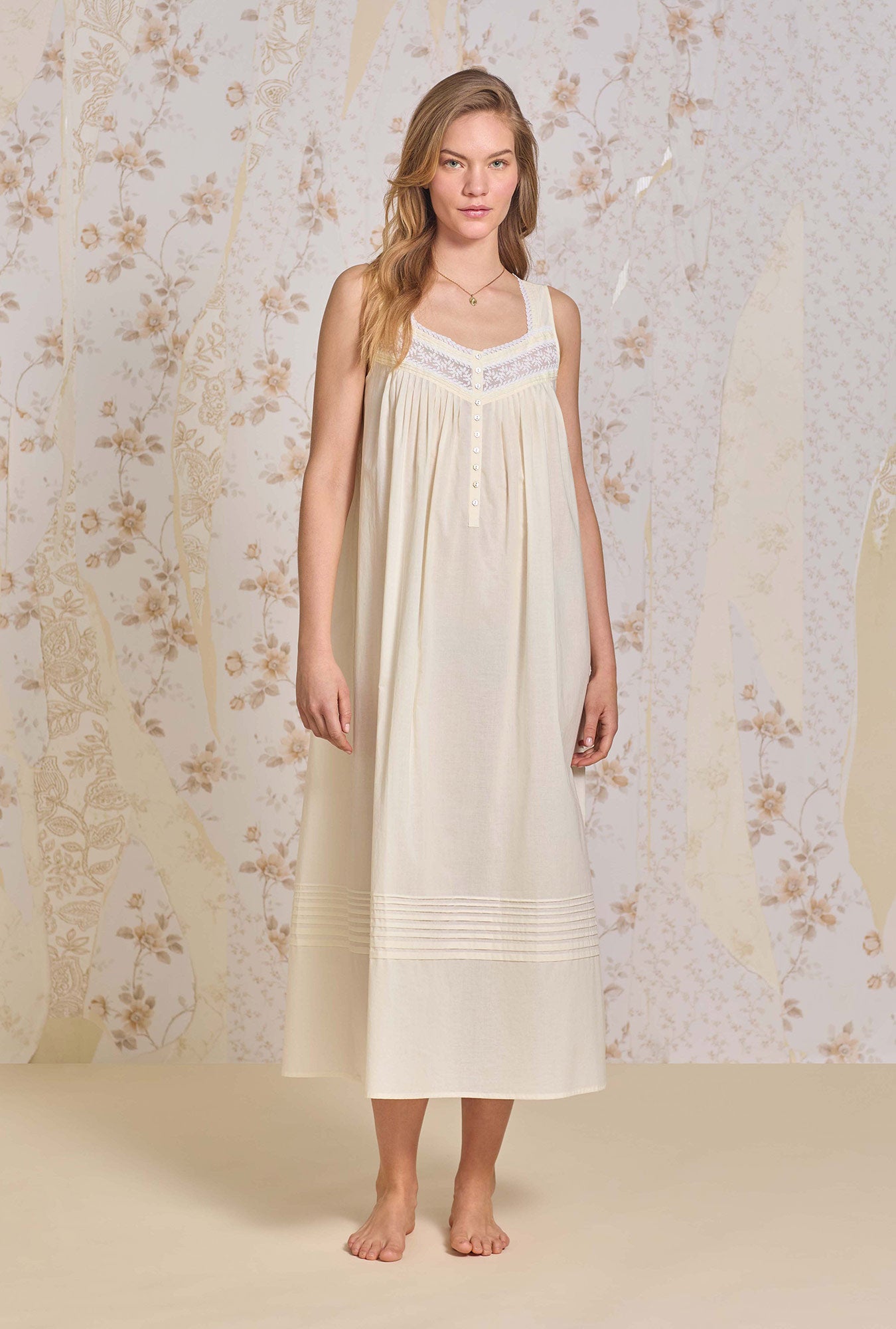A lady wearing The "Eileen" Butter Yellow Cotton Lawn Ballet Nightgown