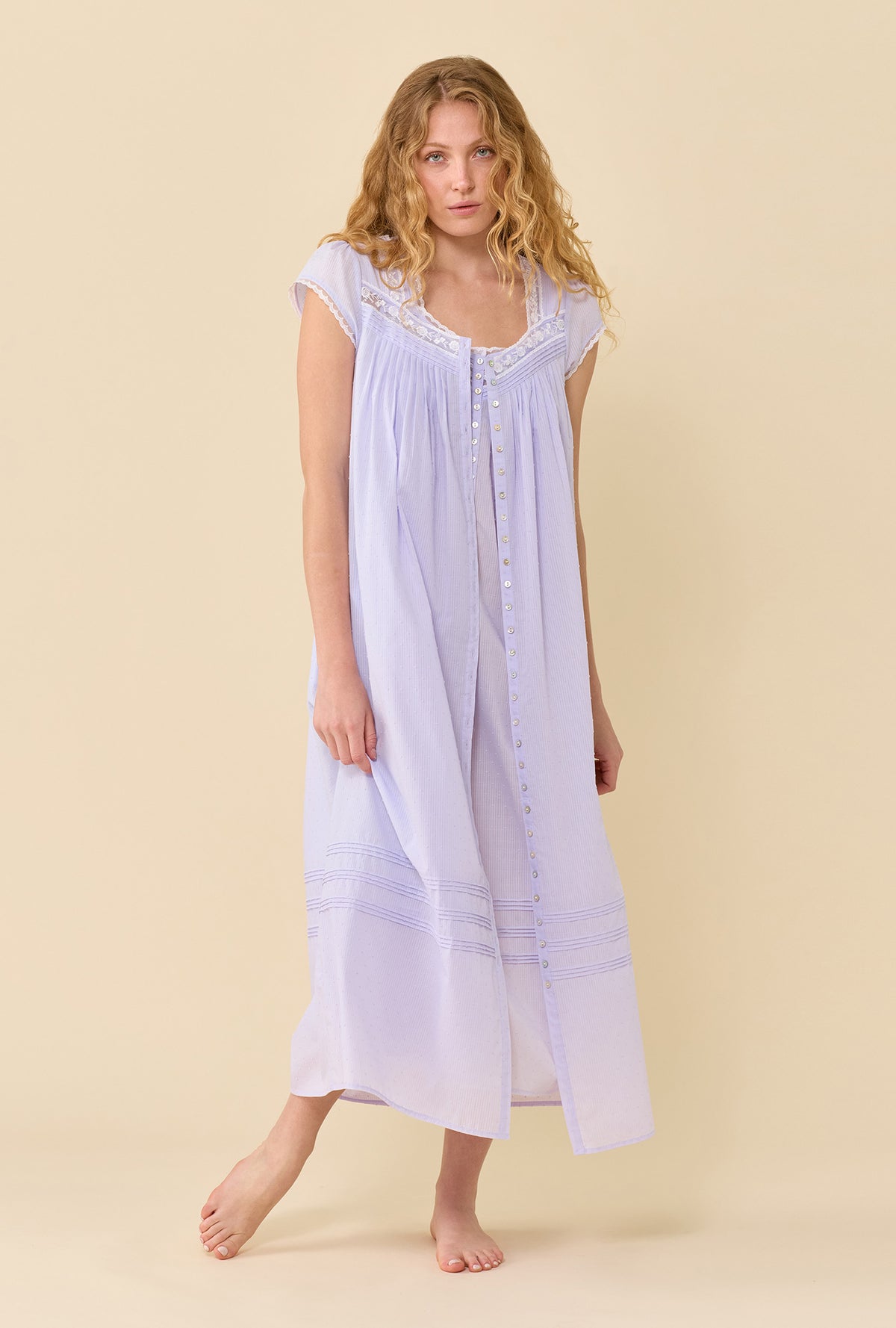 A Lady Wearing Wild Lavender The Eileen Swiss Dot Nightgown styled with a robe in a front view look