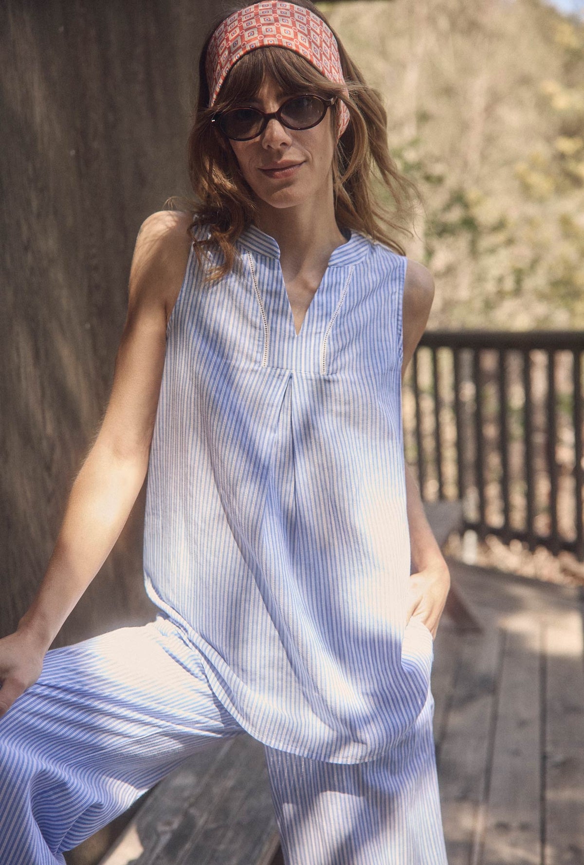 A lady wearing The &quot;Lana&quot; Classic Cotton Stripe Lounge Set