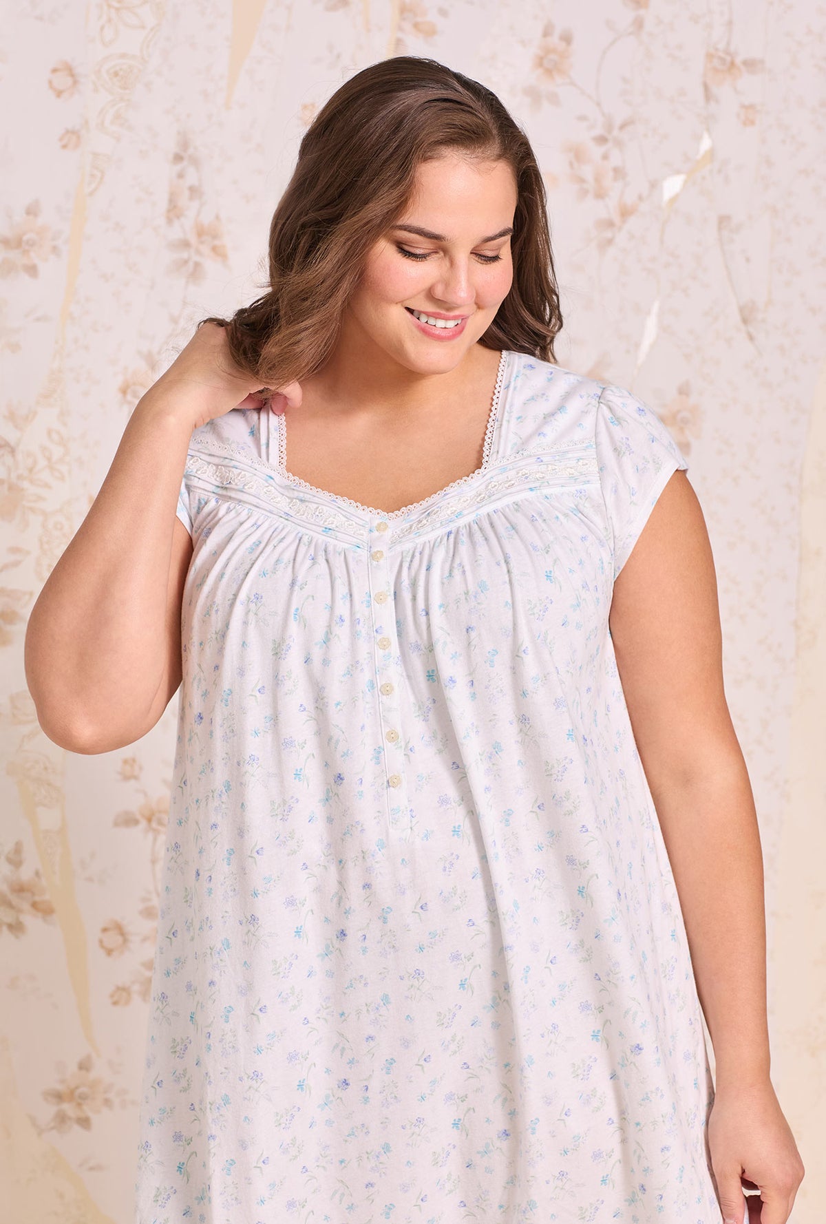 A lady wearing plus size White Meadow Cotton Knit Cap Sleeve Waltz Nightgown closer viewa