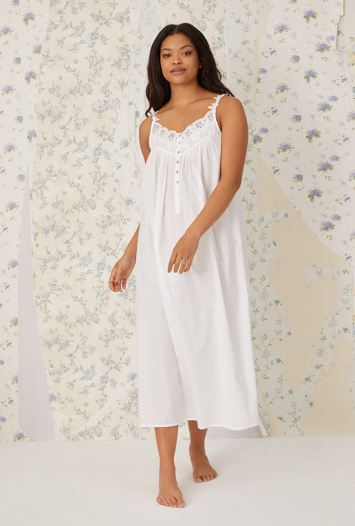 A lady wearing plus size white Florentine Lace Ballet Gown in a front walking pose
