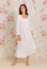 A lady wearing white Long Sleeve Cotton Nightgown with Calla Lily print