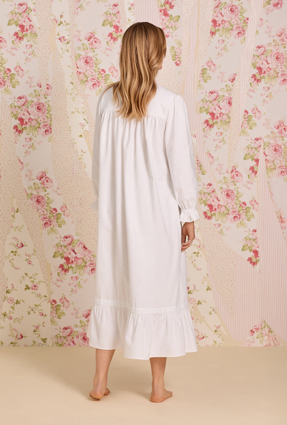 A lady wearing Iconic White Heritage Cotton Flannel Embroidery Highneck Long Nightgown