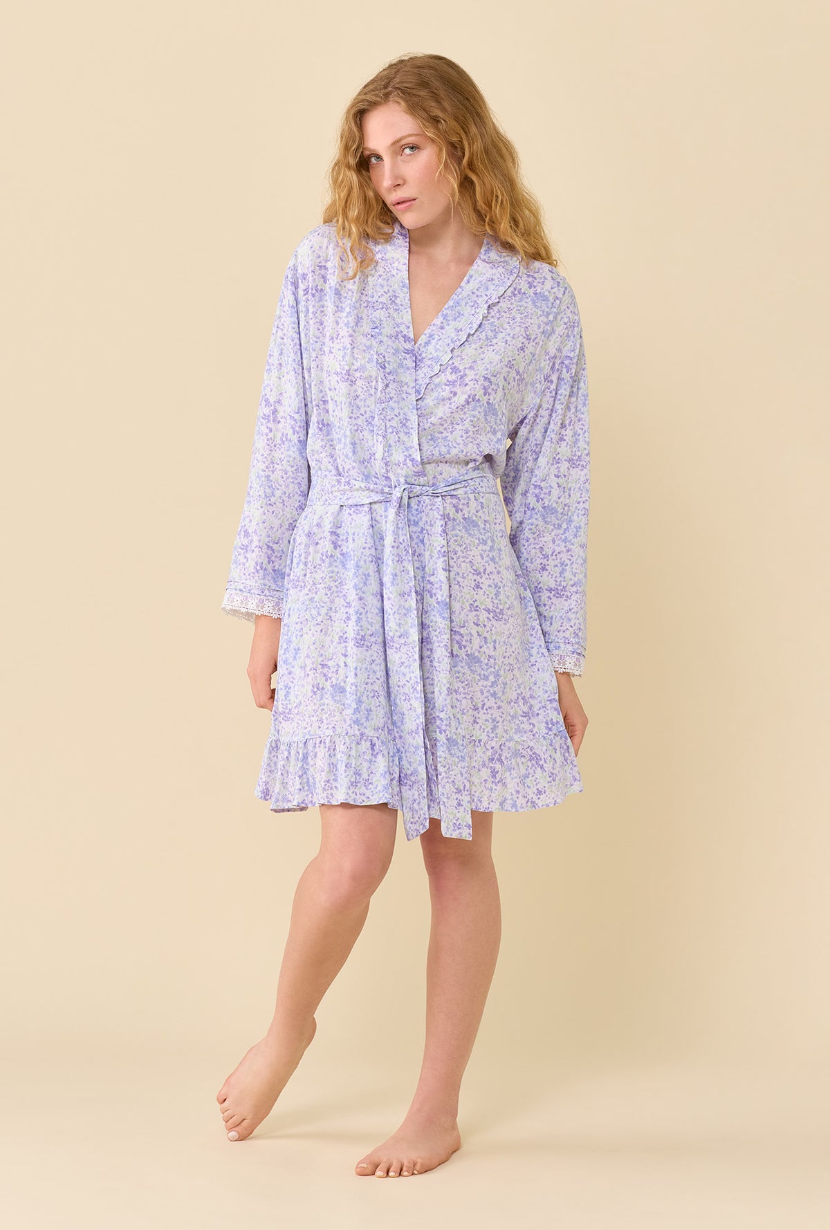 A lady wearing Lavender Whisper Robe looking side
