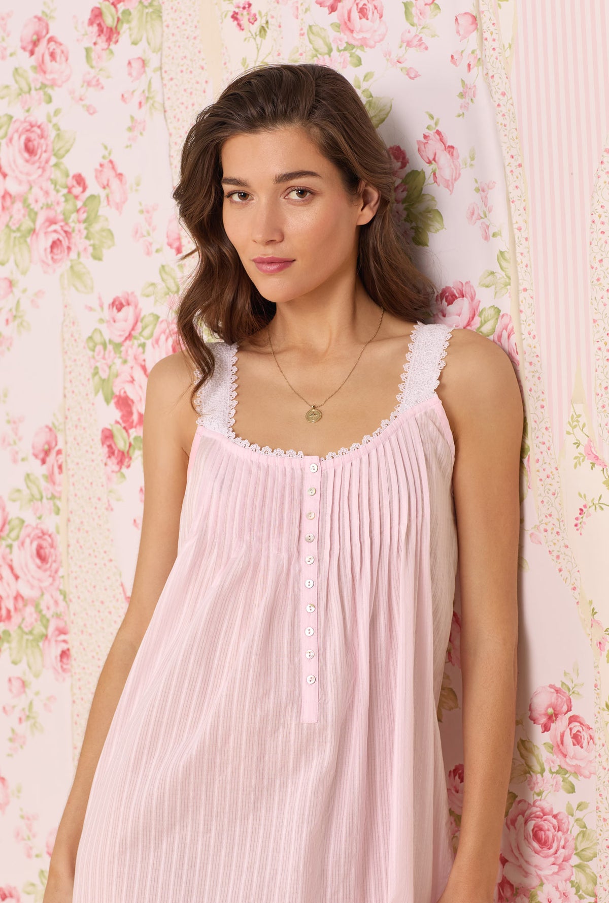 A lady wearing pink Dobby Stripe Gown
