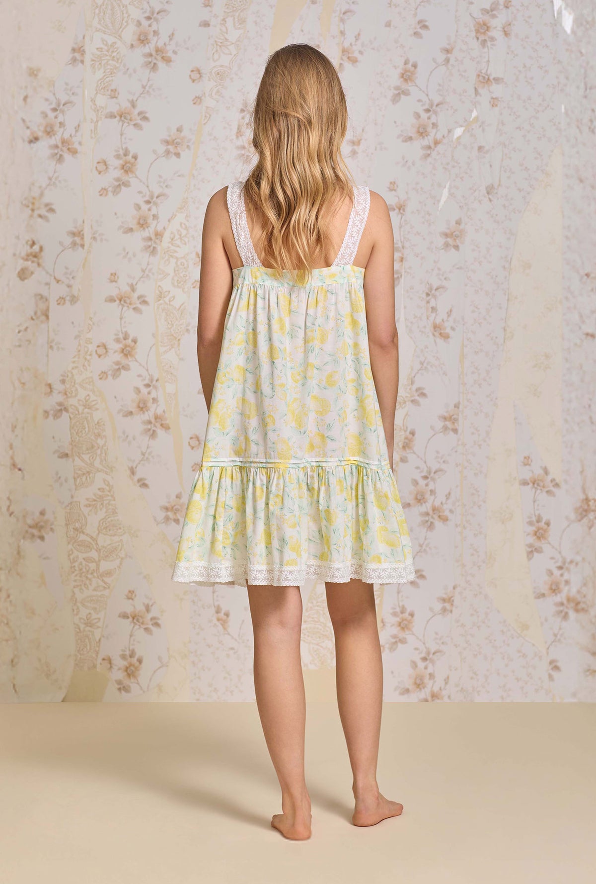 A lady wearing The &quot;Cleo&quot; Limoncello Cotton Lawn Chemise