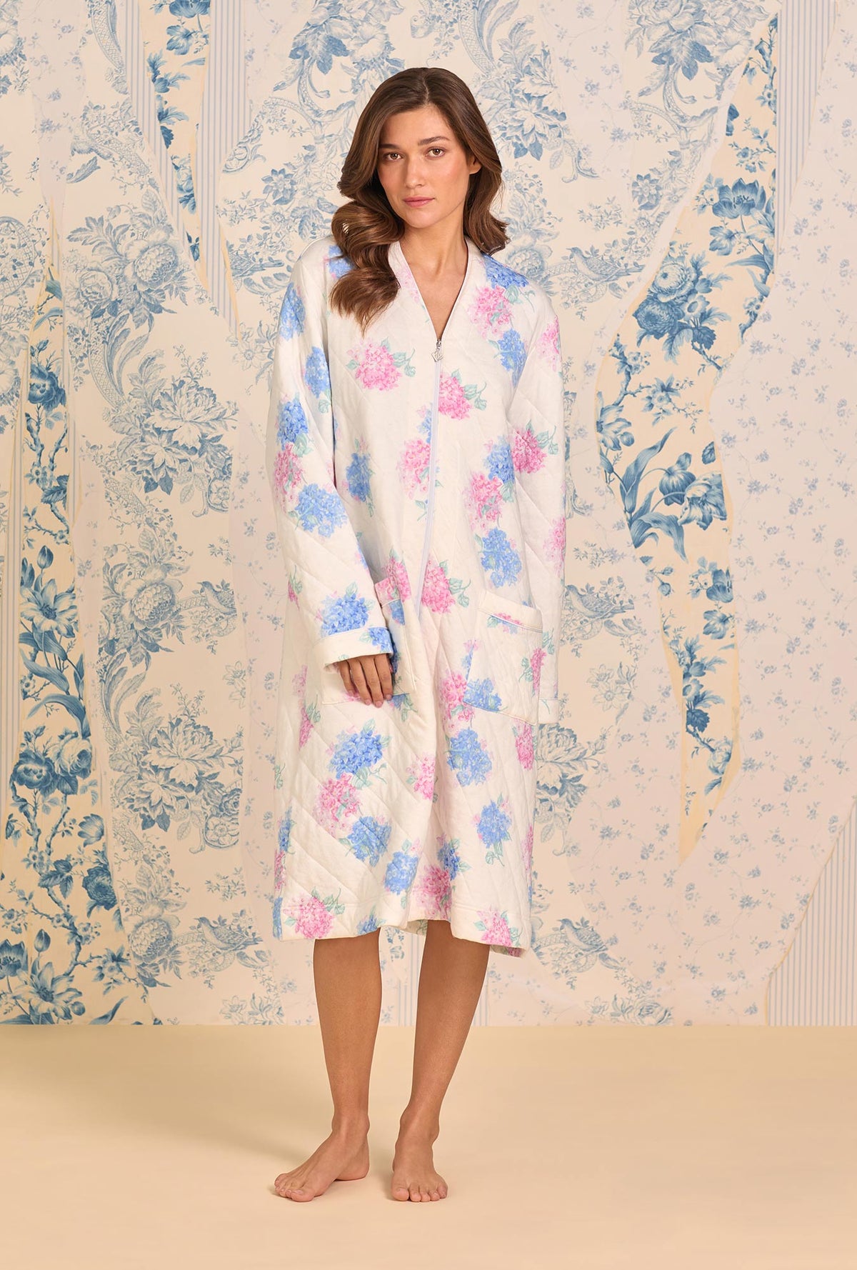 A lady wearing Hydrangea Blossom Dream Diamond Quilt Waltz Zip Robe one hand front