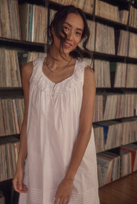 A lady wearing Lace Daydream White Cotton Ruffle Chemise