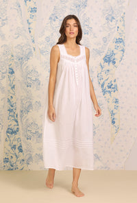 A lady wearing Dobby Stripe White Gown